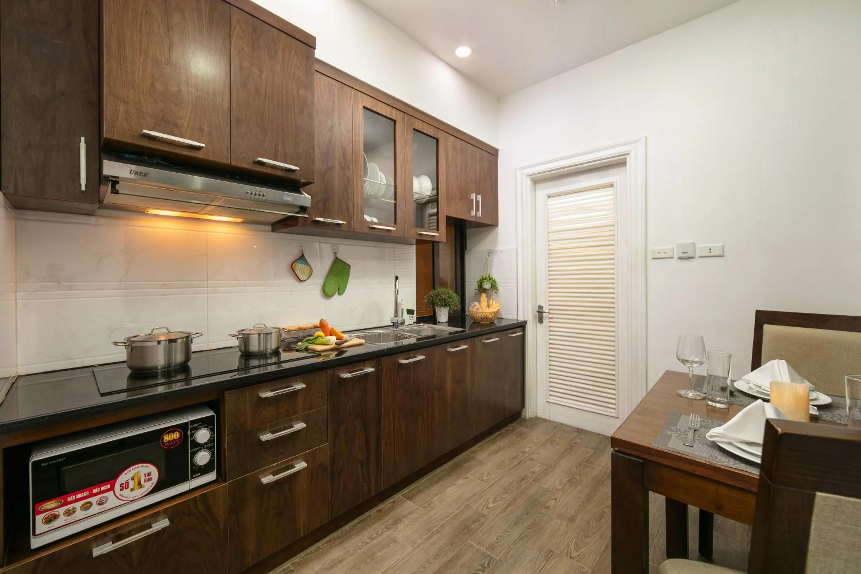 Kitchen or kitchenette in Poonsa Hanoi - The Ordinary Living