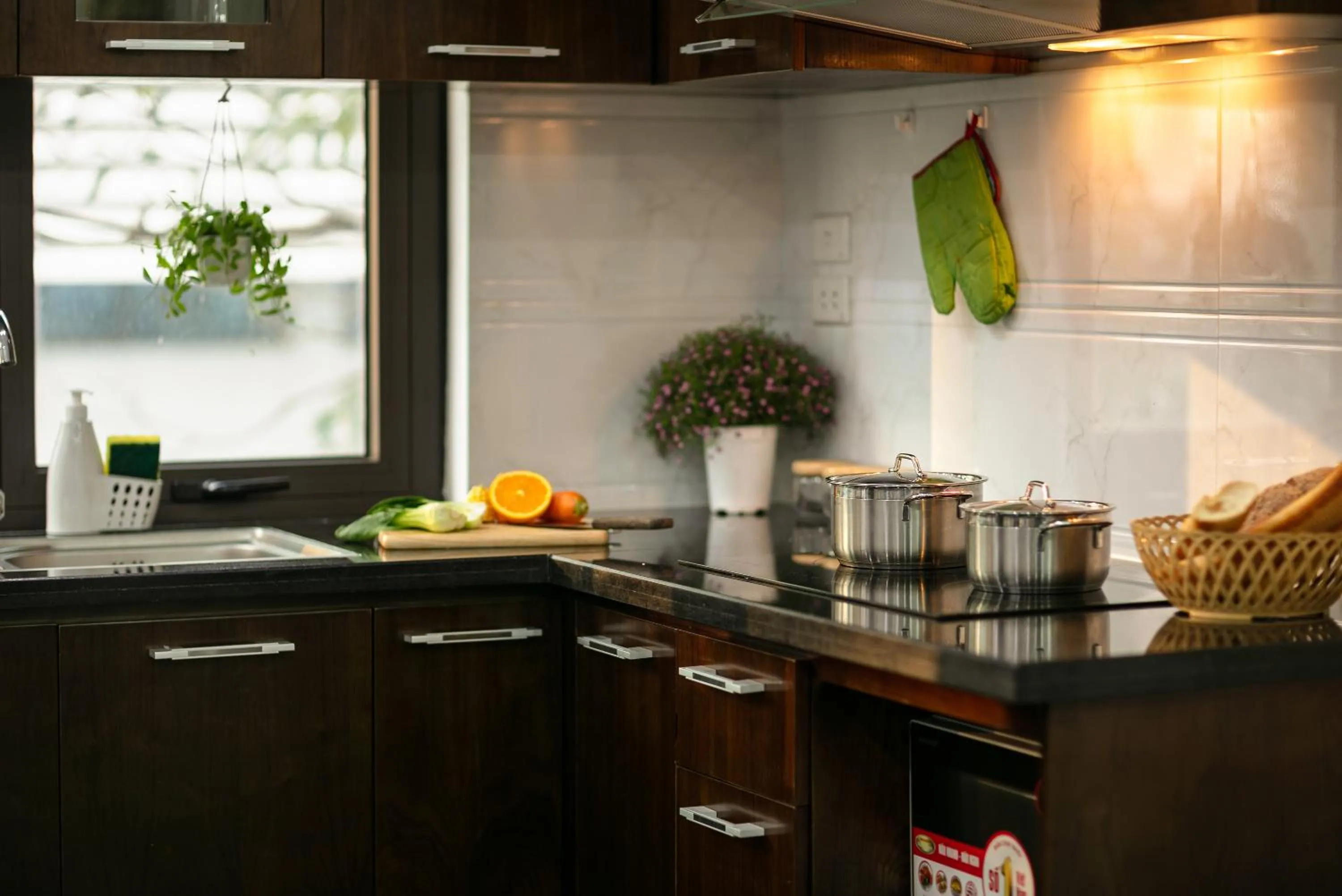 Kitchen or kitchenette in Poonsa Hanoi - The Ordinary Living