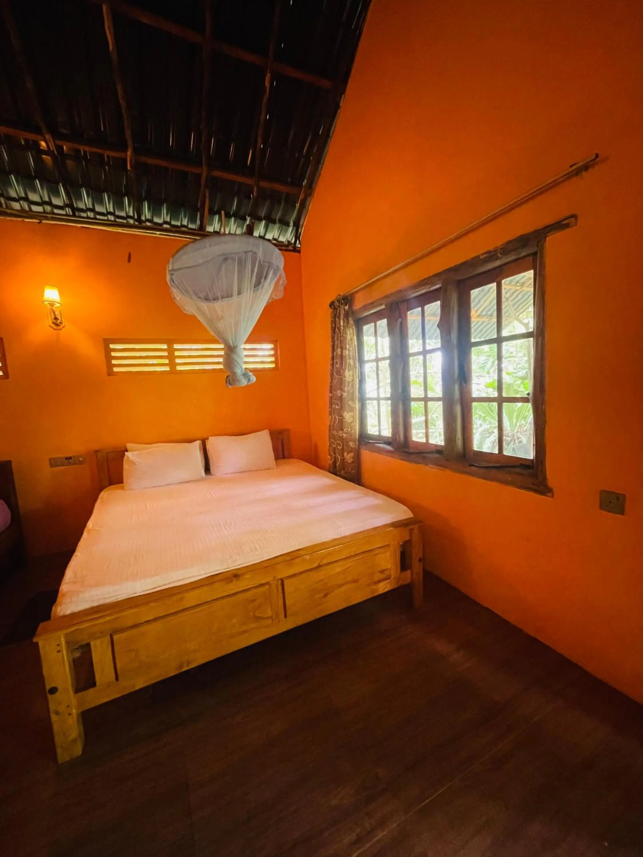 Bed in LakeSide Cabana Tissamaharama