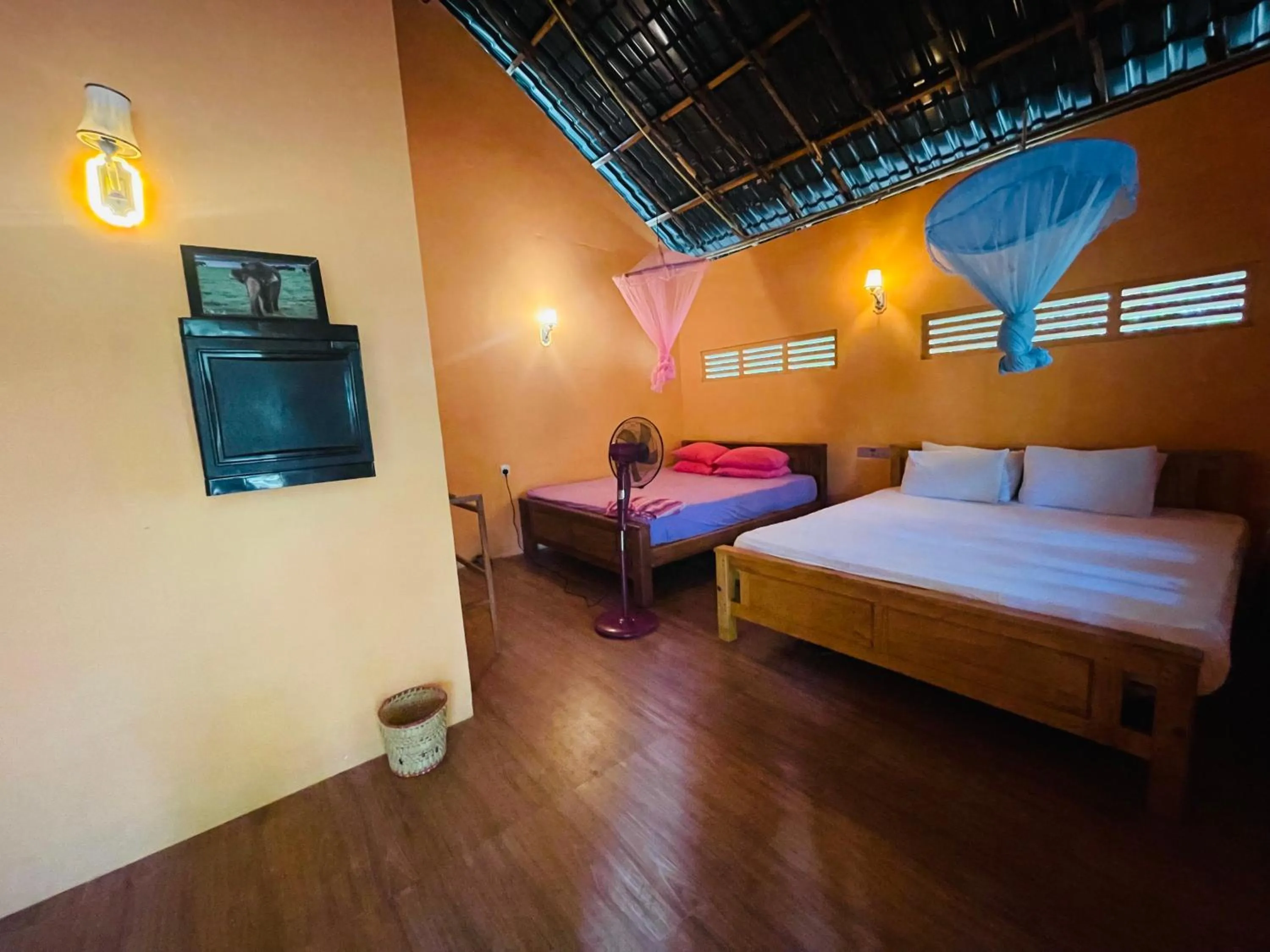 Bed in LakeSide Cabana Tissamaharama