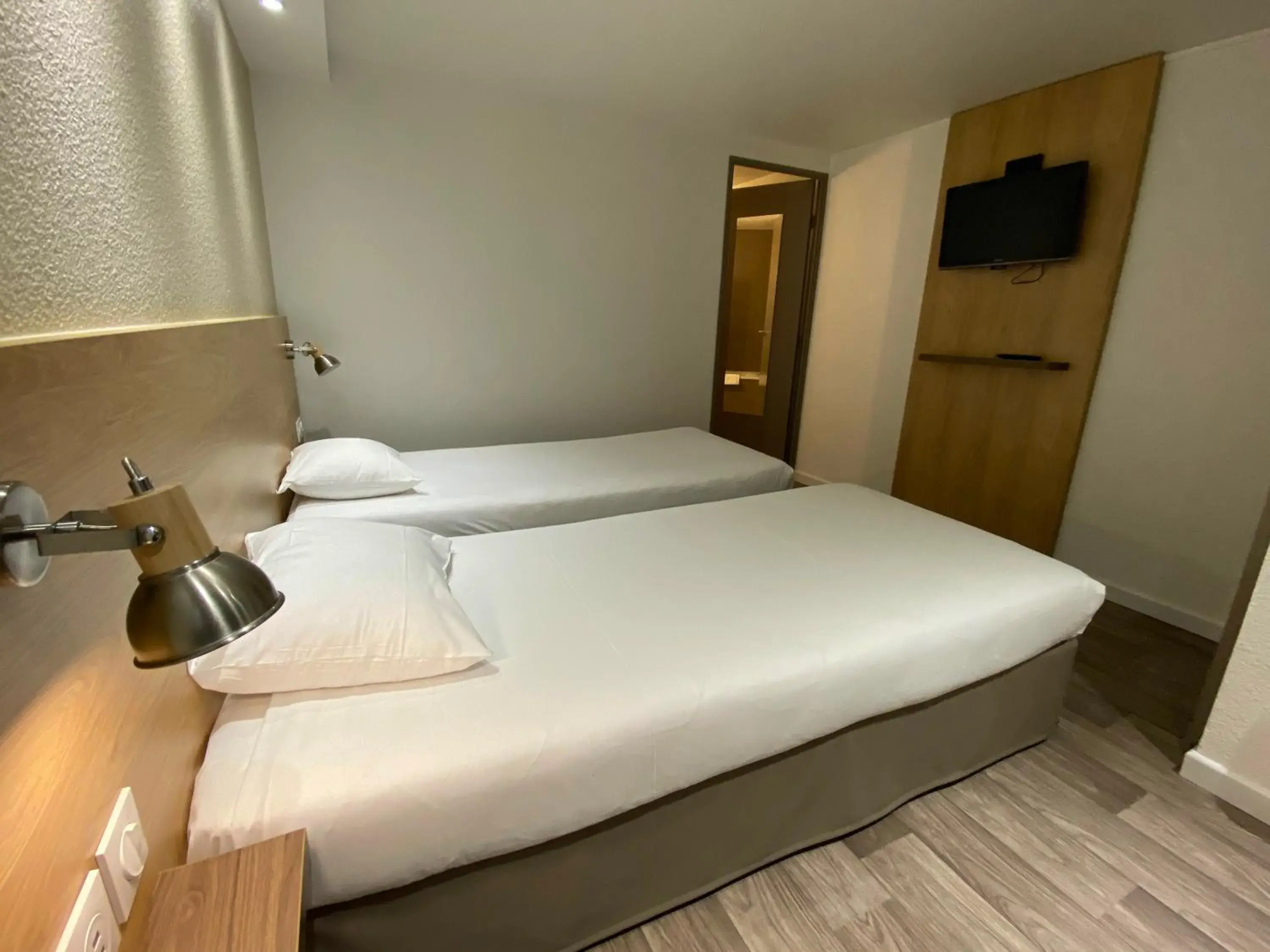 Bed in Kyriad Fontenay - Trésigny Bed in Kyriad Fontenay - Trésigny