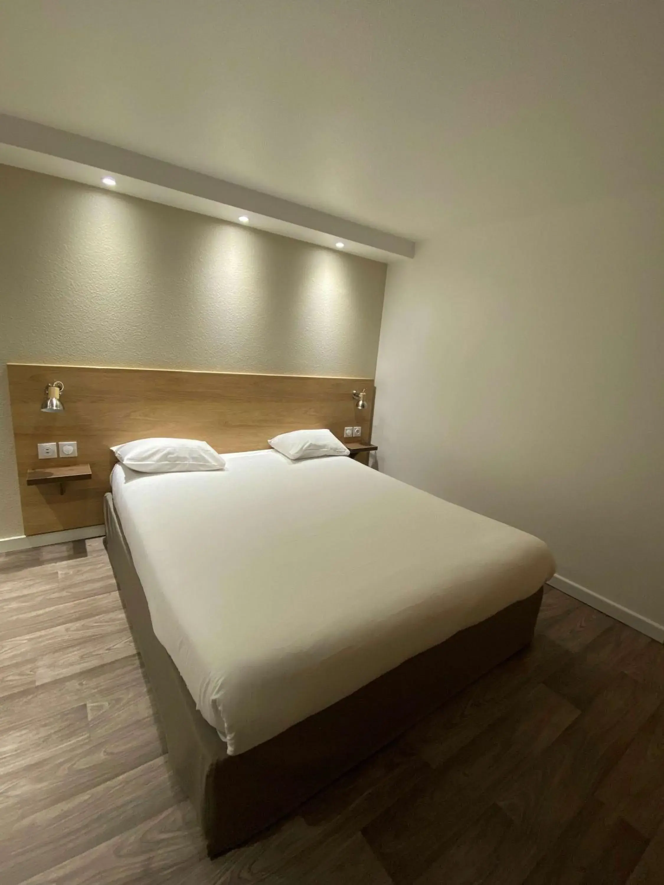 Bed in Kyriad Fontenay - Trésigny Bed in Kyriad Fontenay - Trésigny