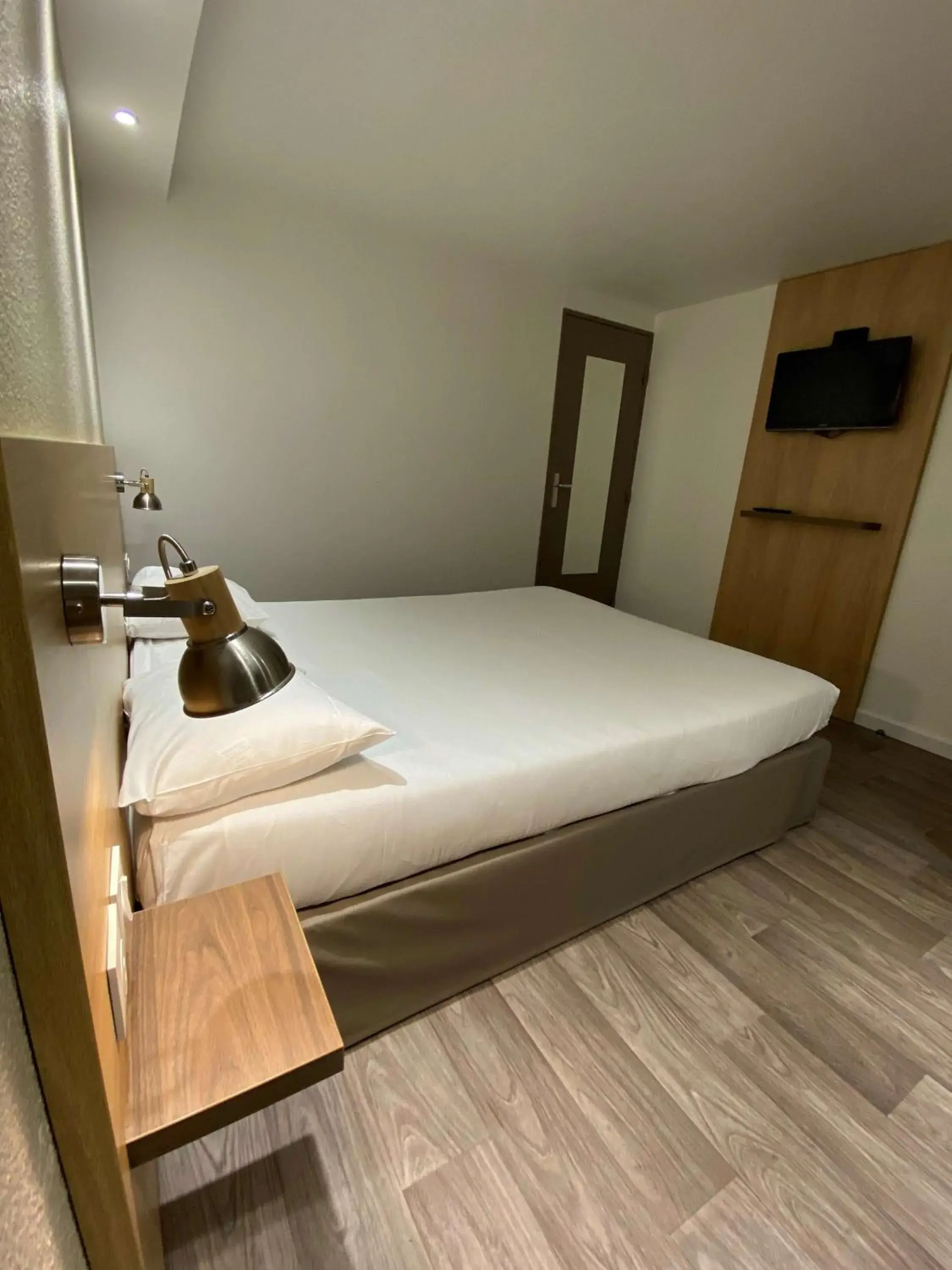 Bed in Kyriad Fontenay - Trésigny Bed in Kyriad Fontenay - Trésigny