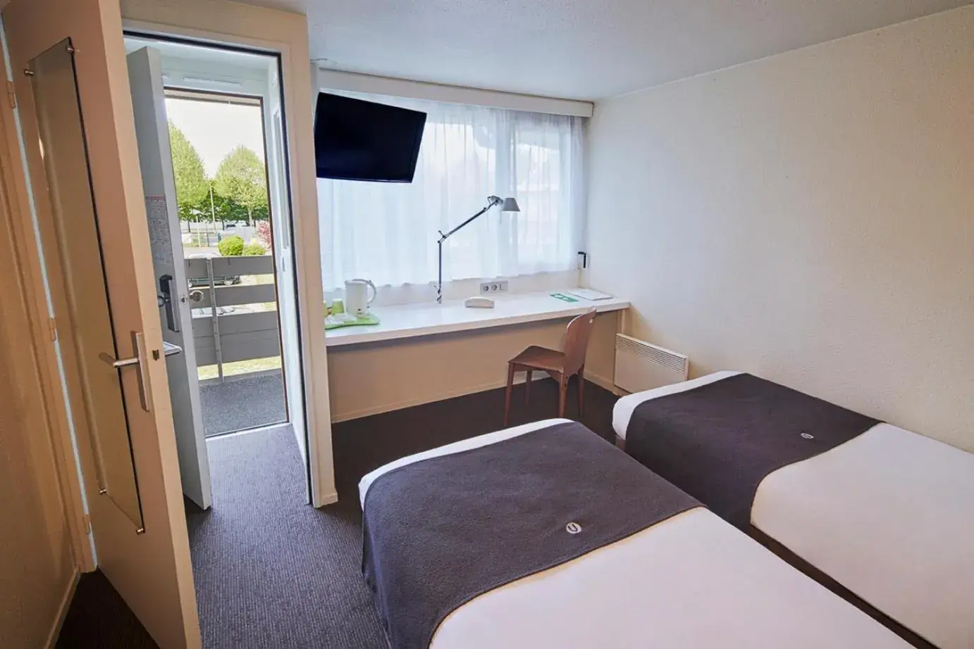 Bed in Campanile Melun Sénart Bed in Campanile Melun Sénart