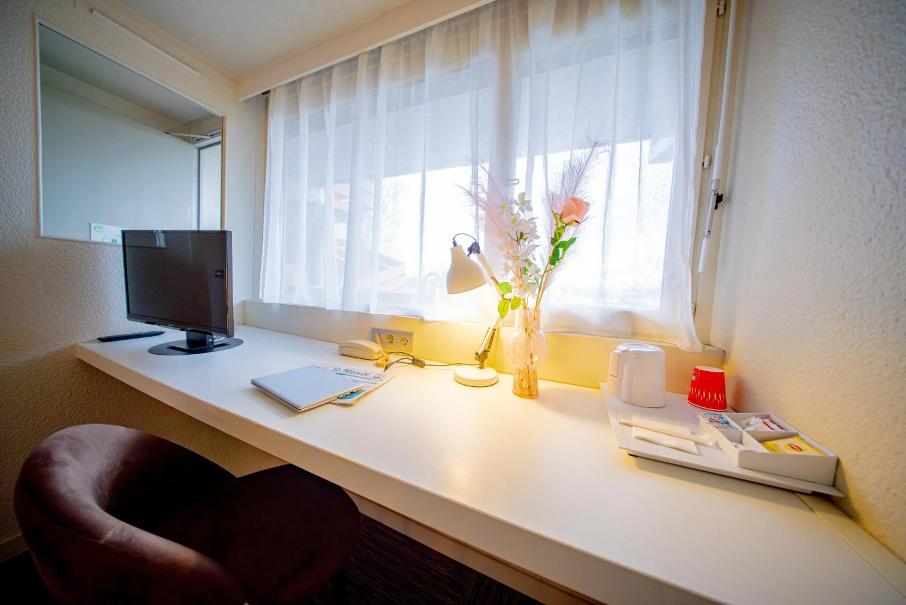 TV and multimedia in Ampaline HOTEL - Perigueux Boulazac