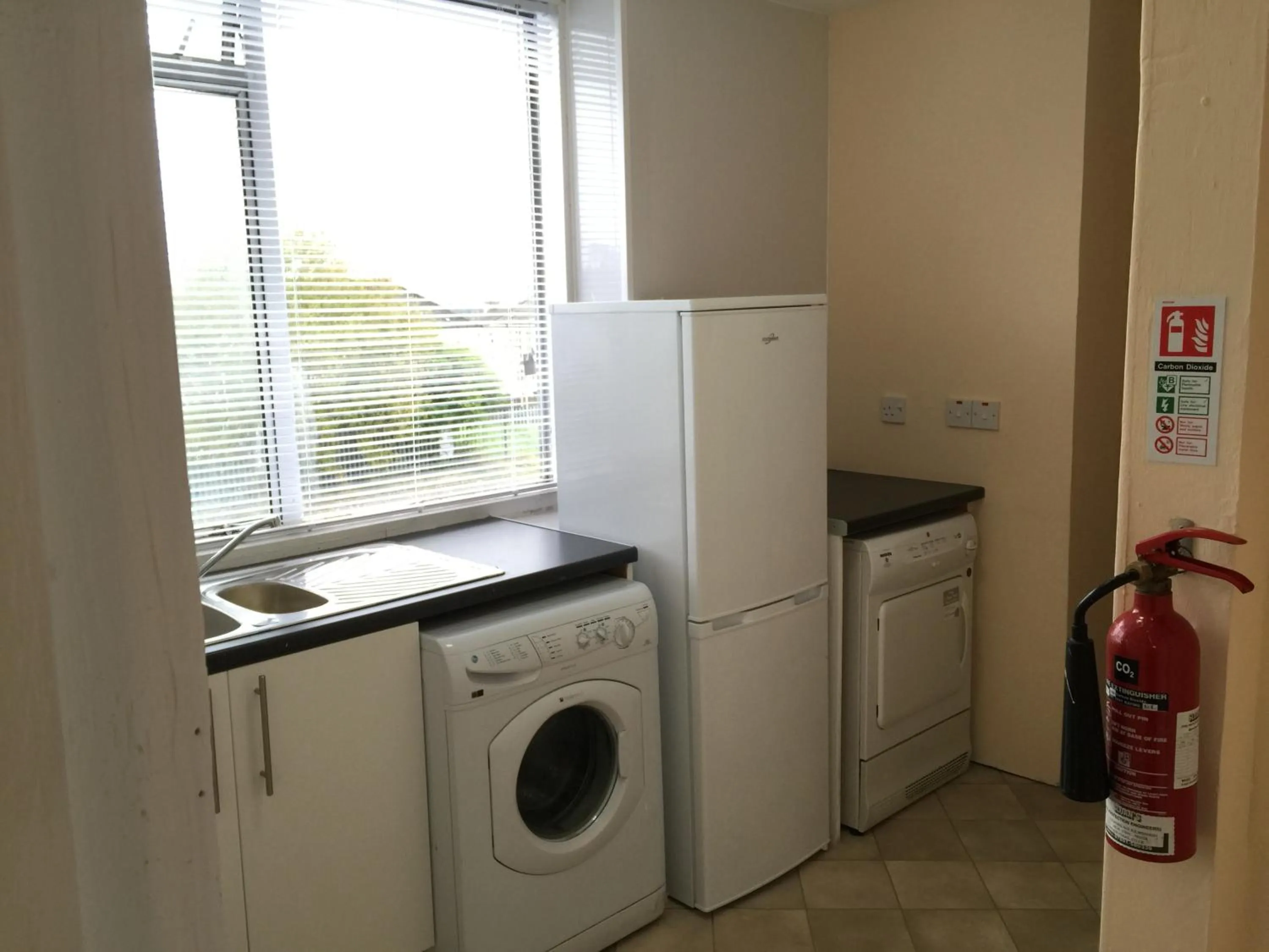 Kitchen or kitchenette in Laughing Buddha Guesthouse