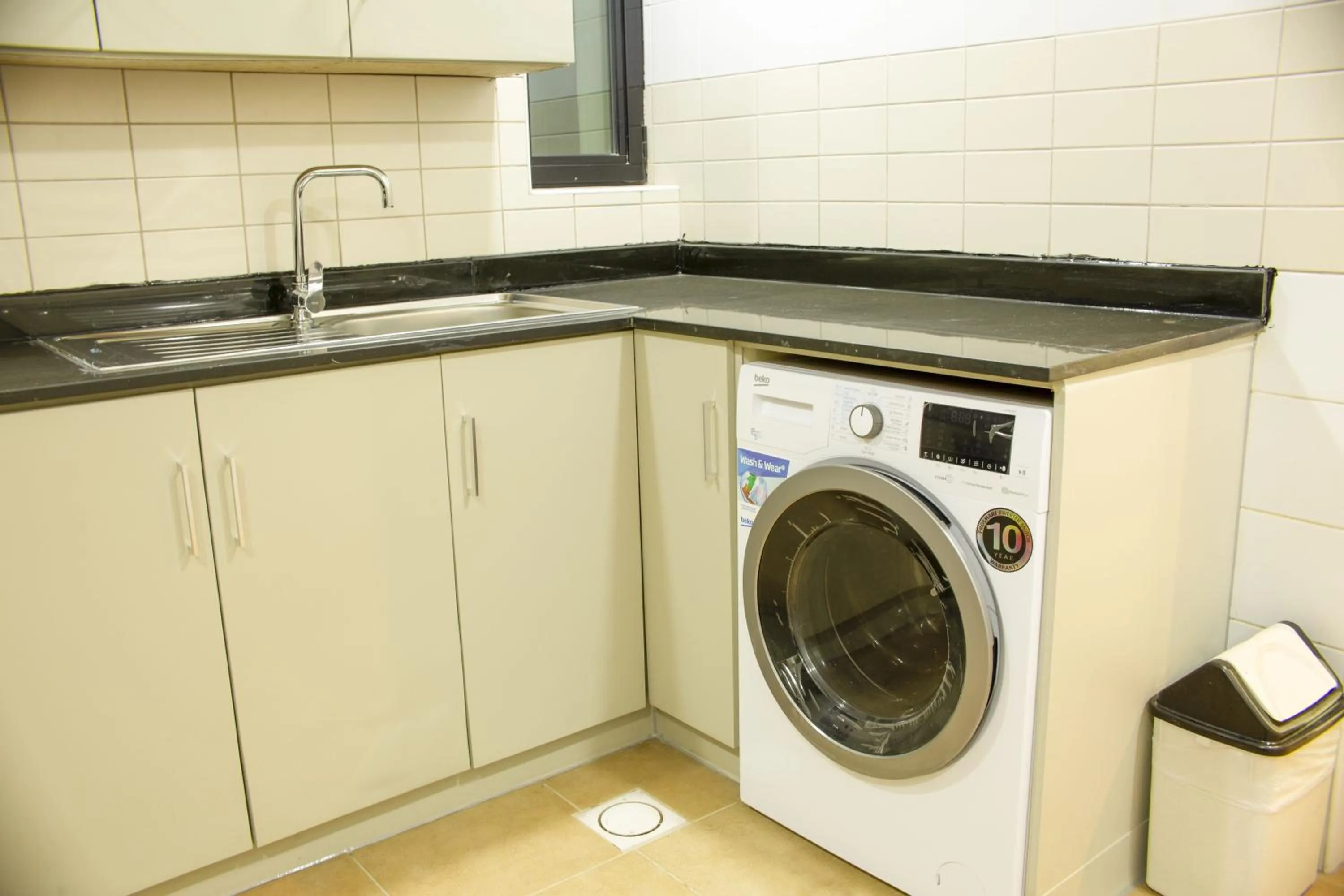 Kitchen or kitchenette in Infinity Tower Suites WLL