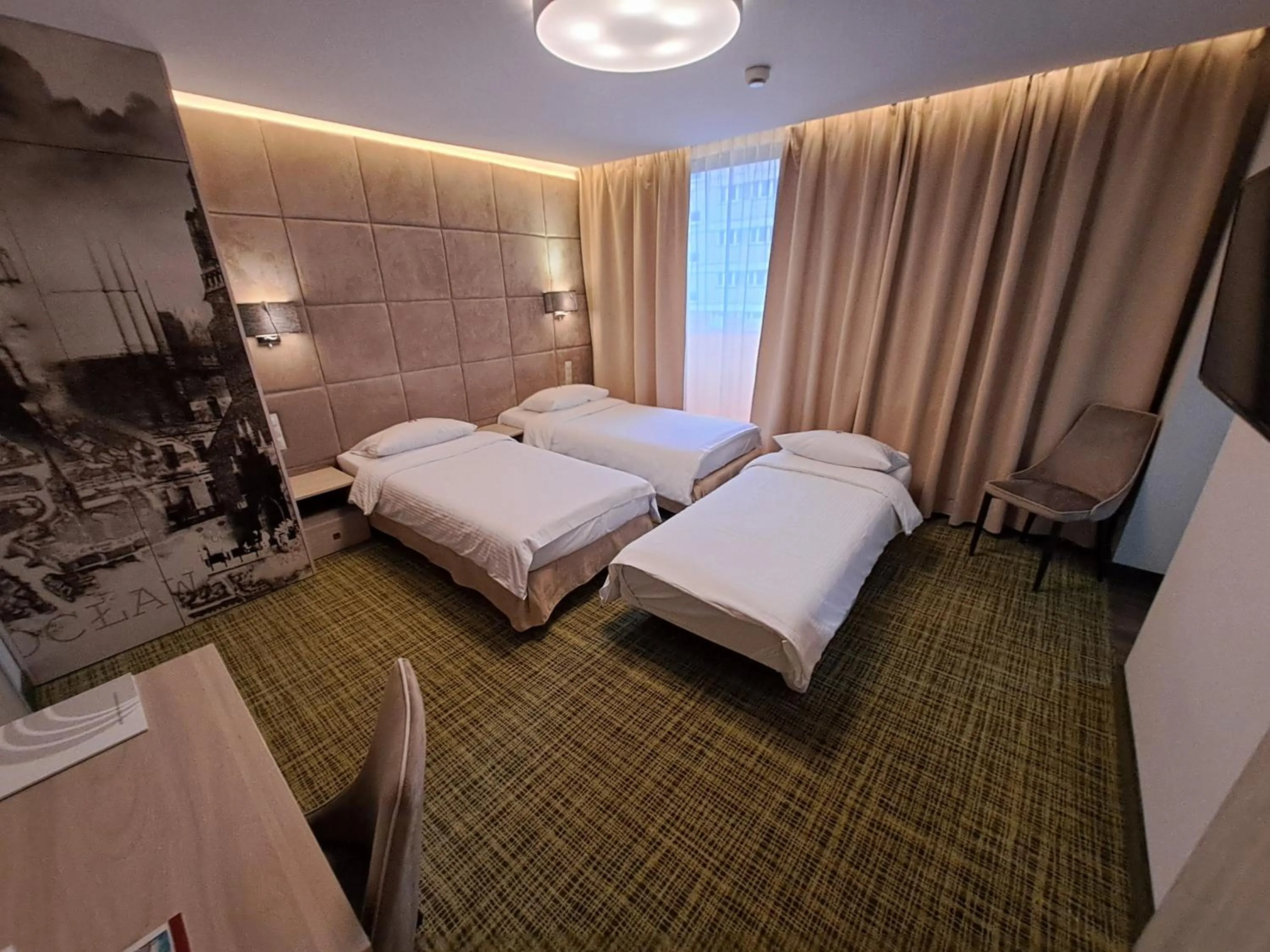 Bed in Citi Hotel's Wrocław