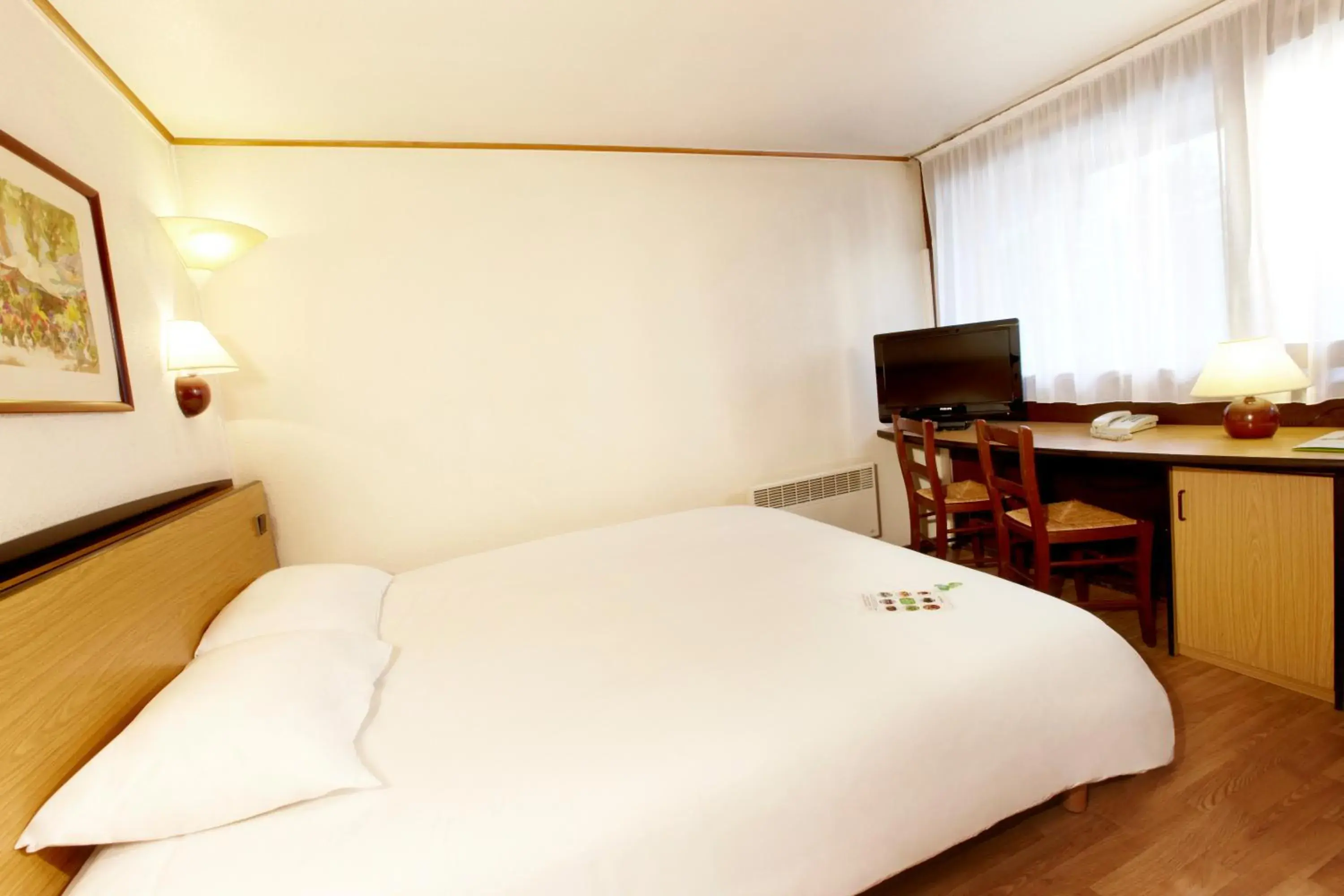 Bed in Campanile Grenoble Nord - Moirans-Voreppe Bed in Campanile Grenoble Nord - Moirans-Voreppe
