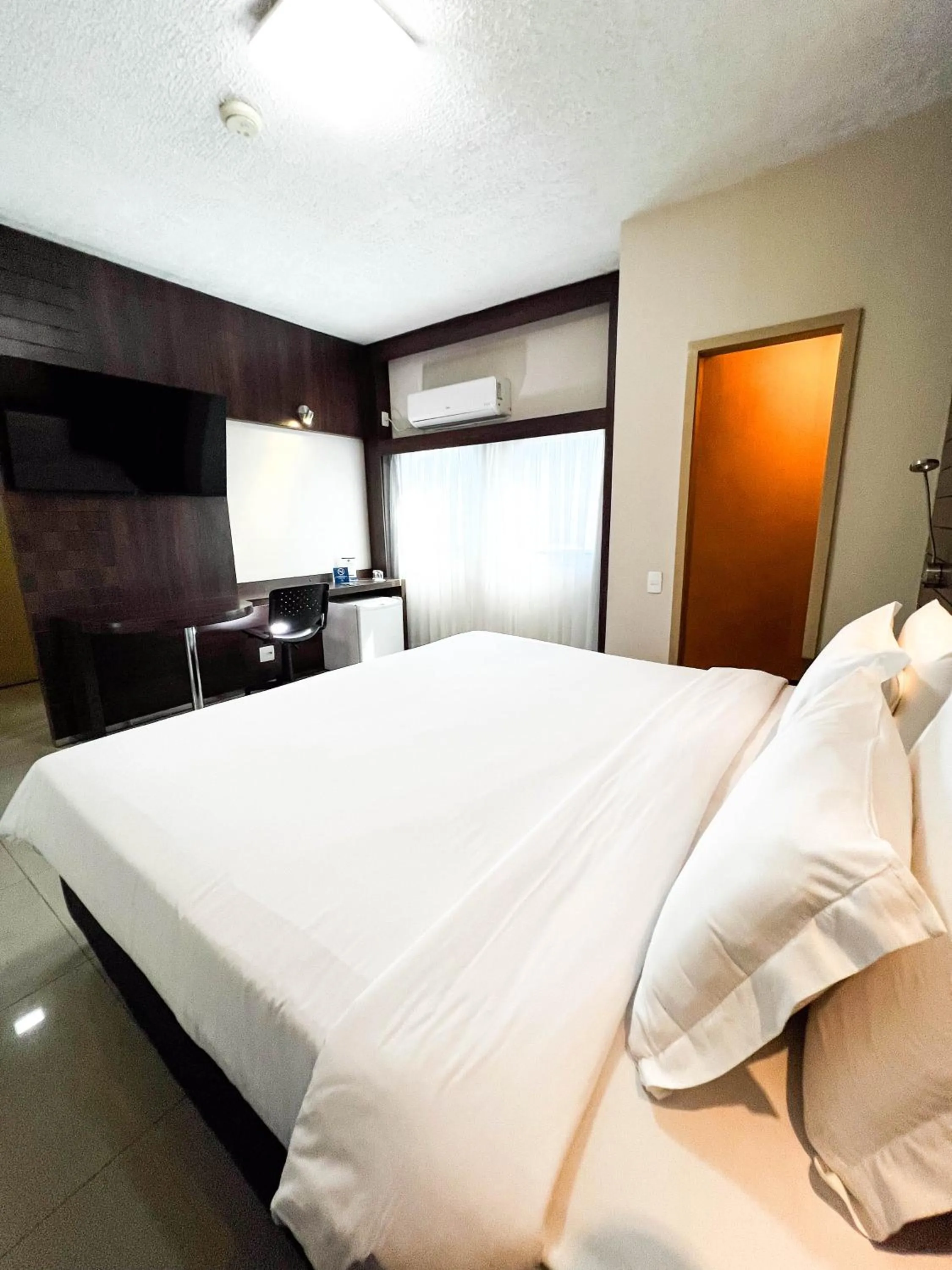 Bed in Royal Center Hotel Lourdes