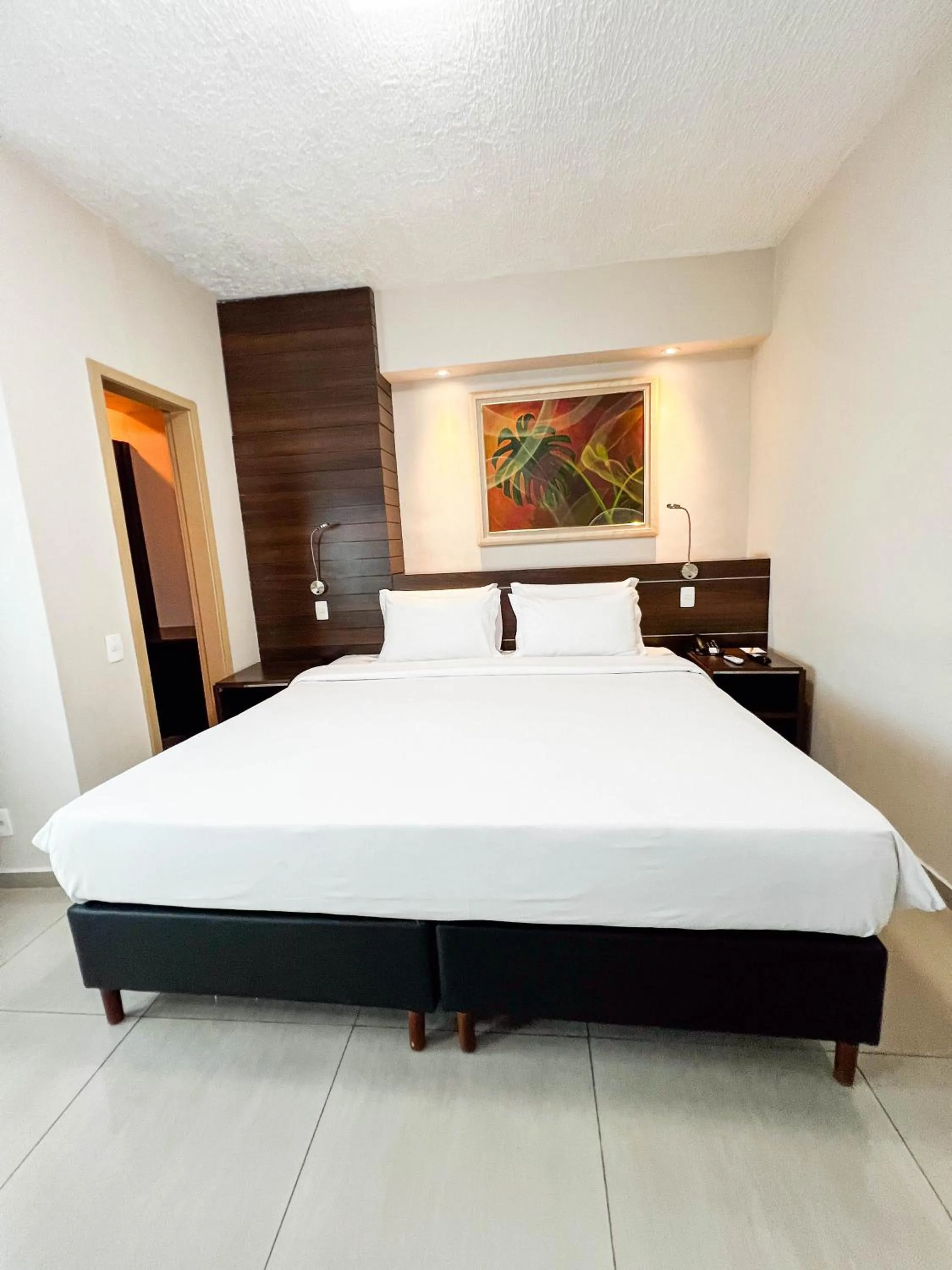 Bed in Royal Center Hotel Lourdes