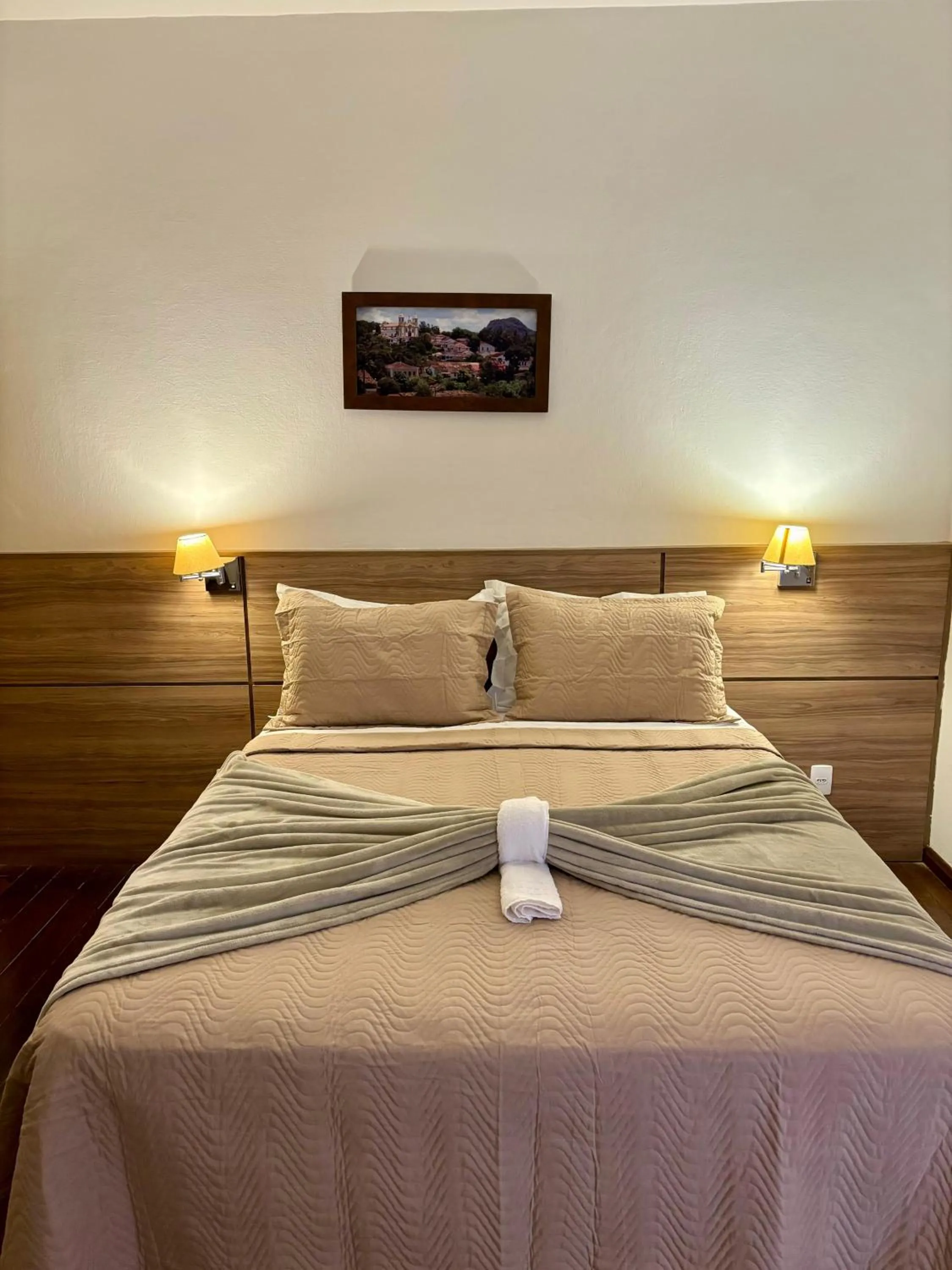 Bed in Pousada o Amanhecer