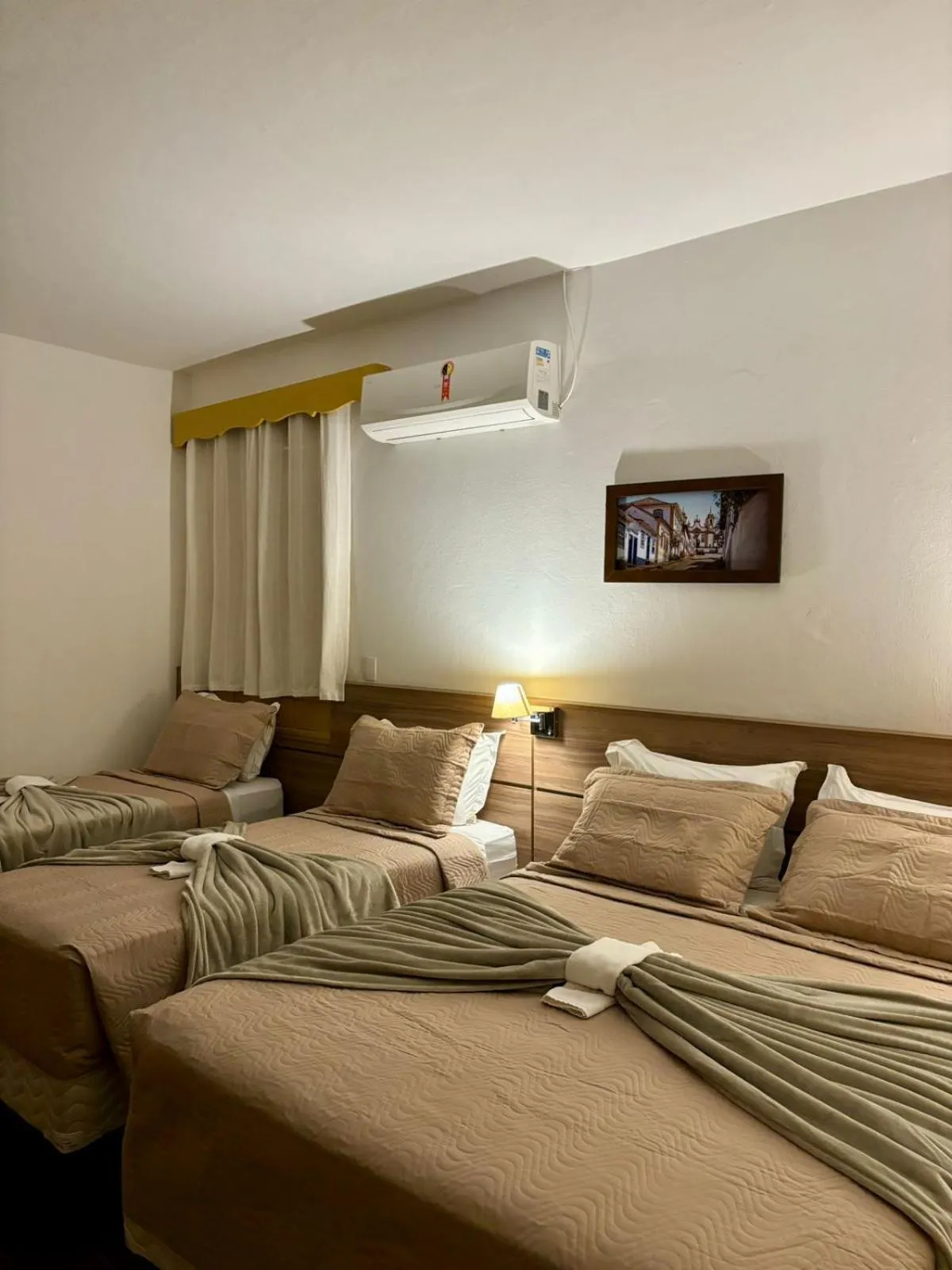 Bed in Pousada o Amanhecer