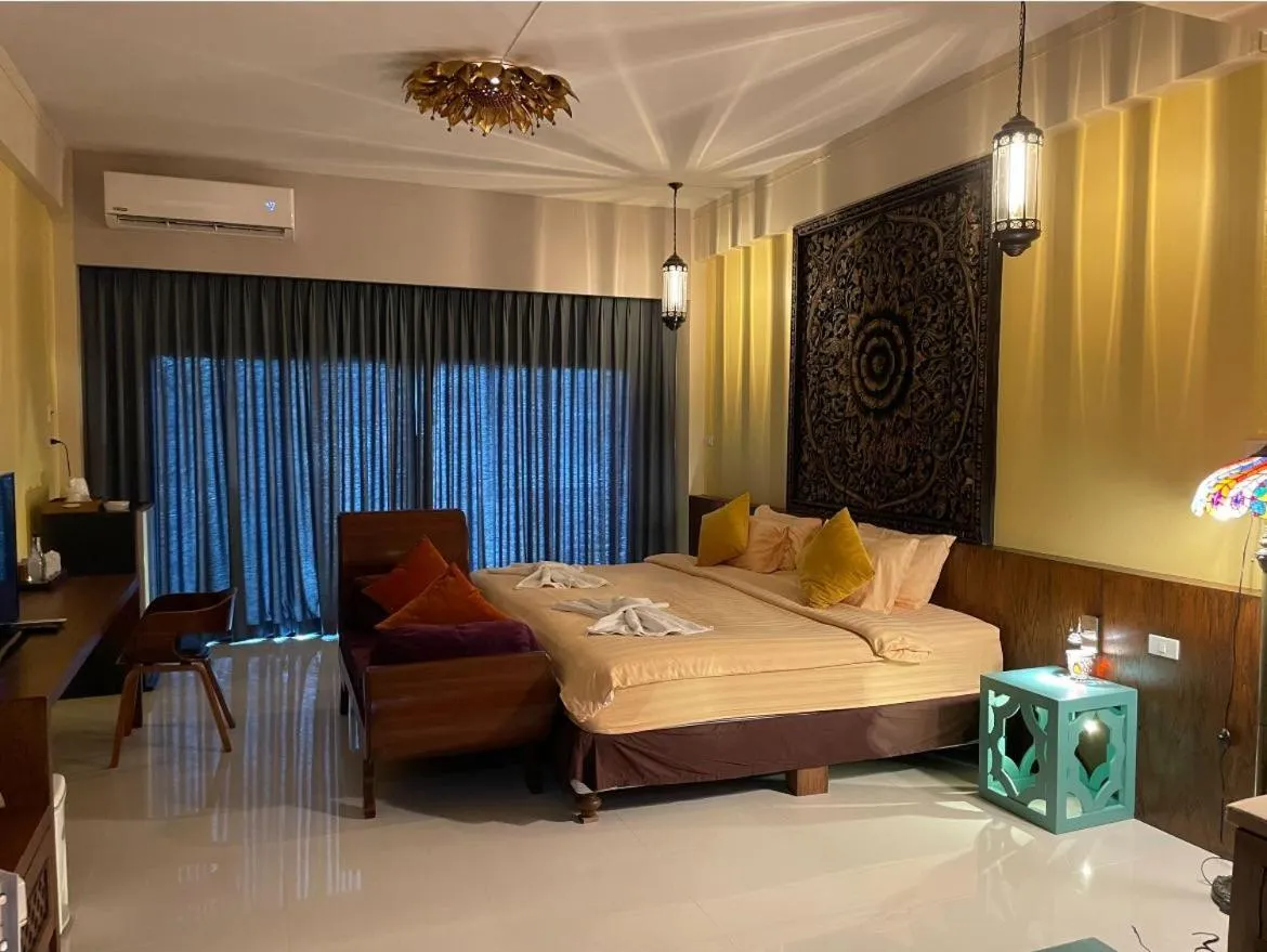 Bed in The Iconic Hotel Ranong