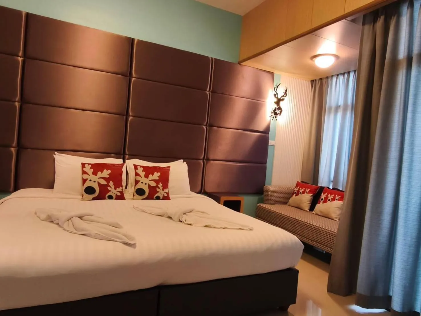 Bed in The Iconic Hotel Ranong