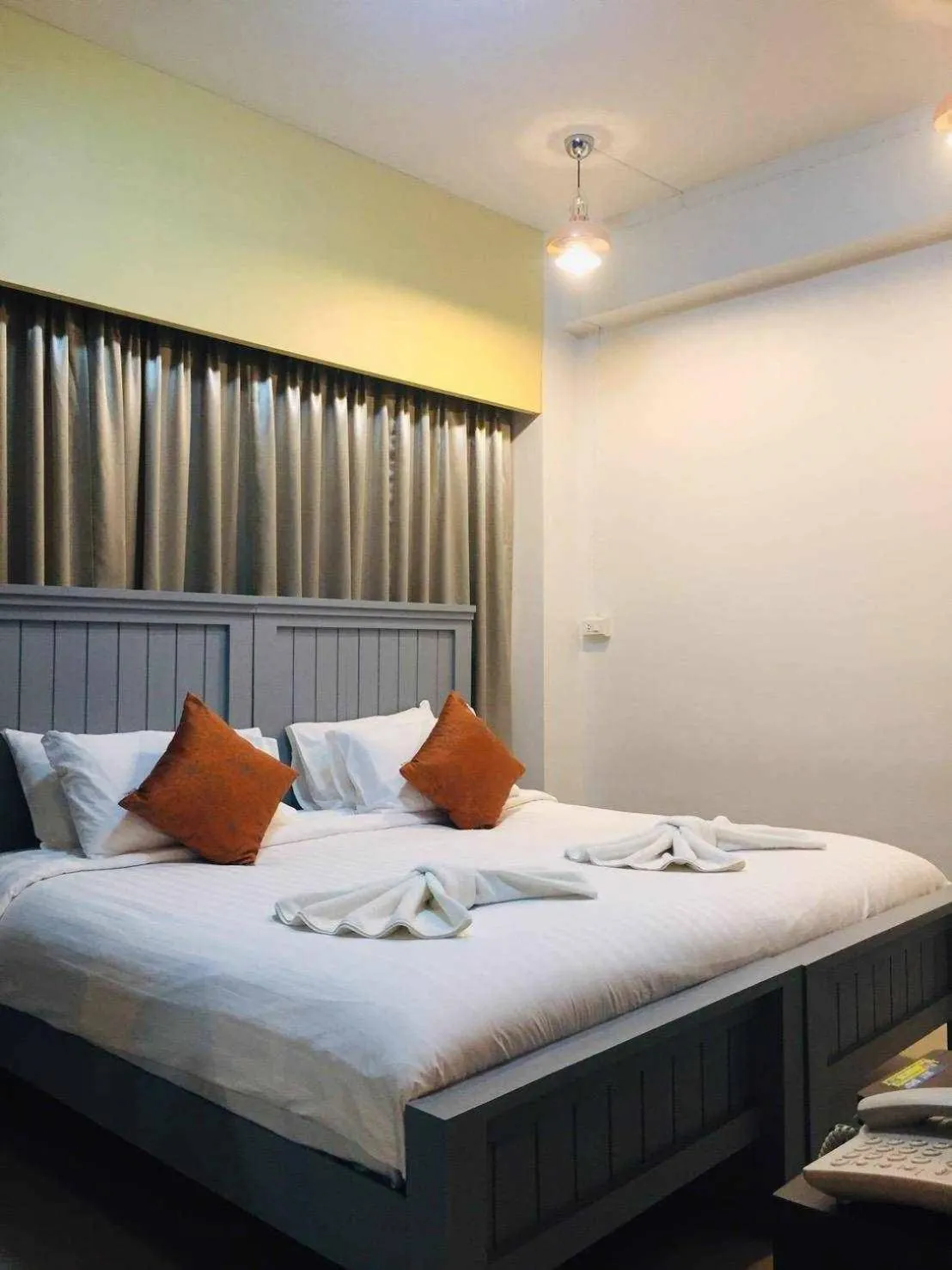 Bed in The Iconic Hotel Ranong