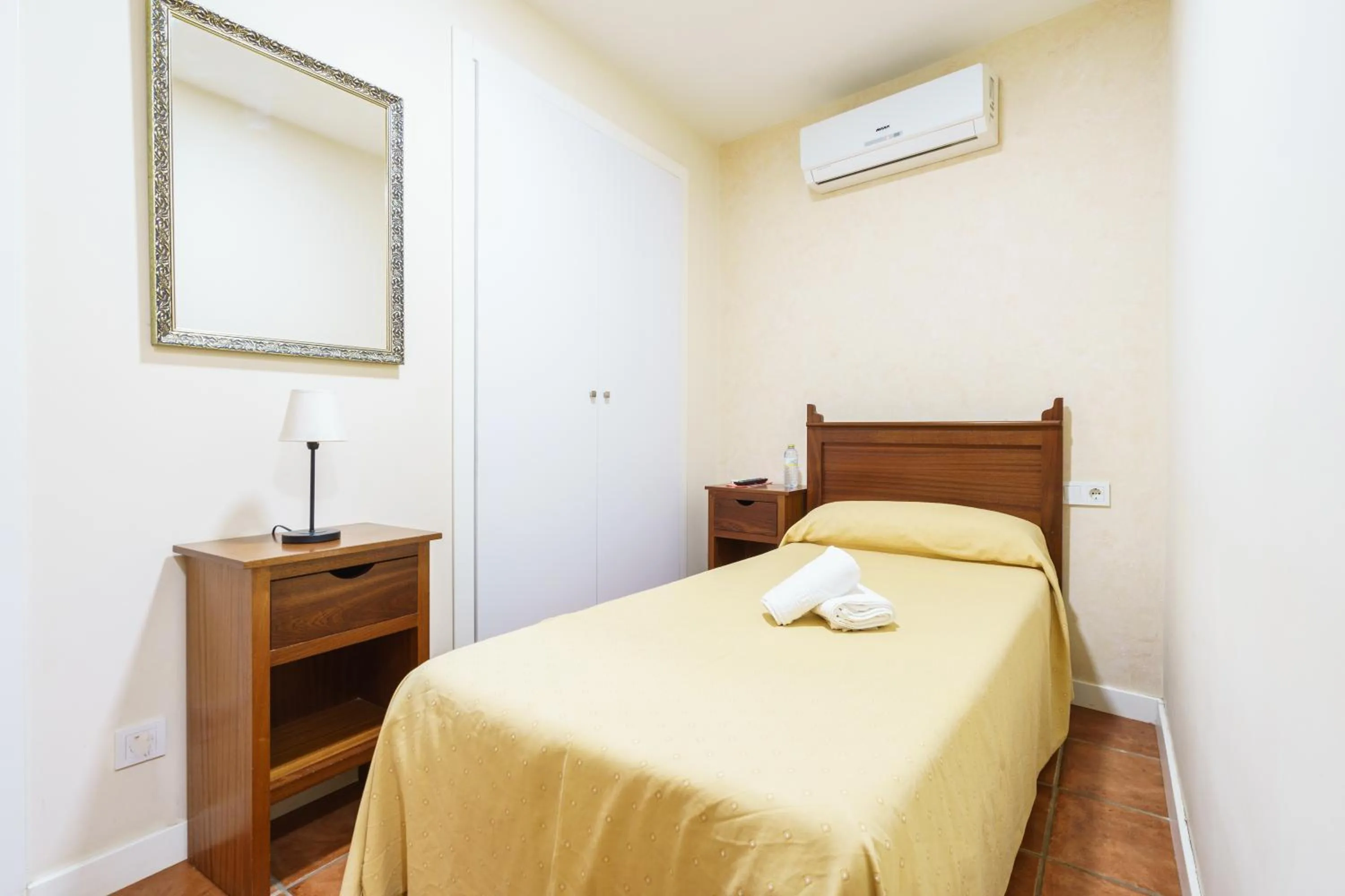 Bed in Hotel Carlos V Jerez by Vivere Stays