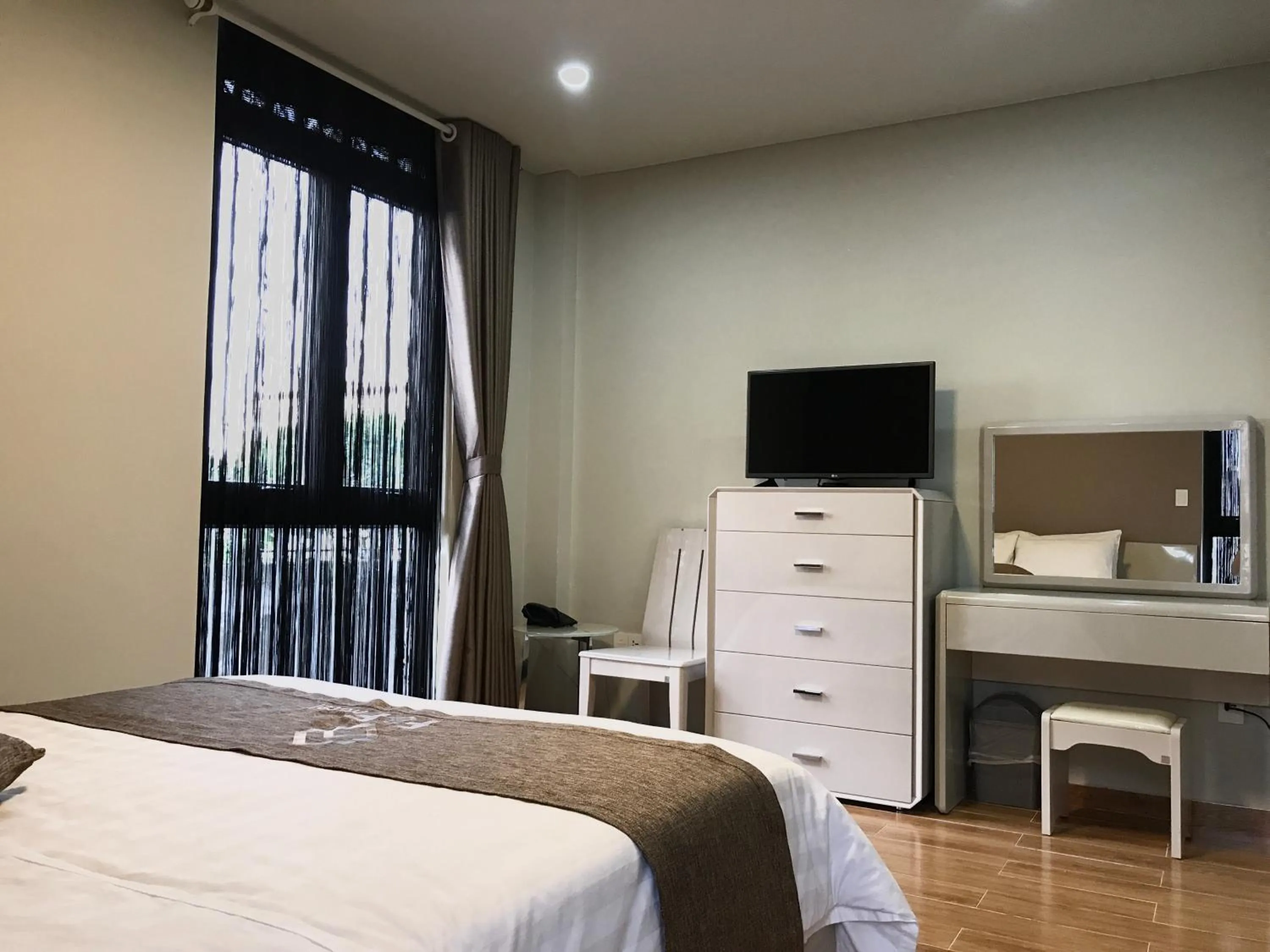 Photo of the whole room, Bed in F & F Hotel