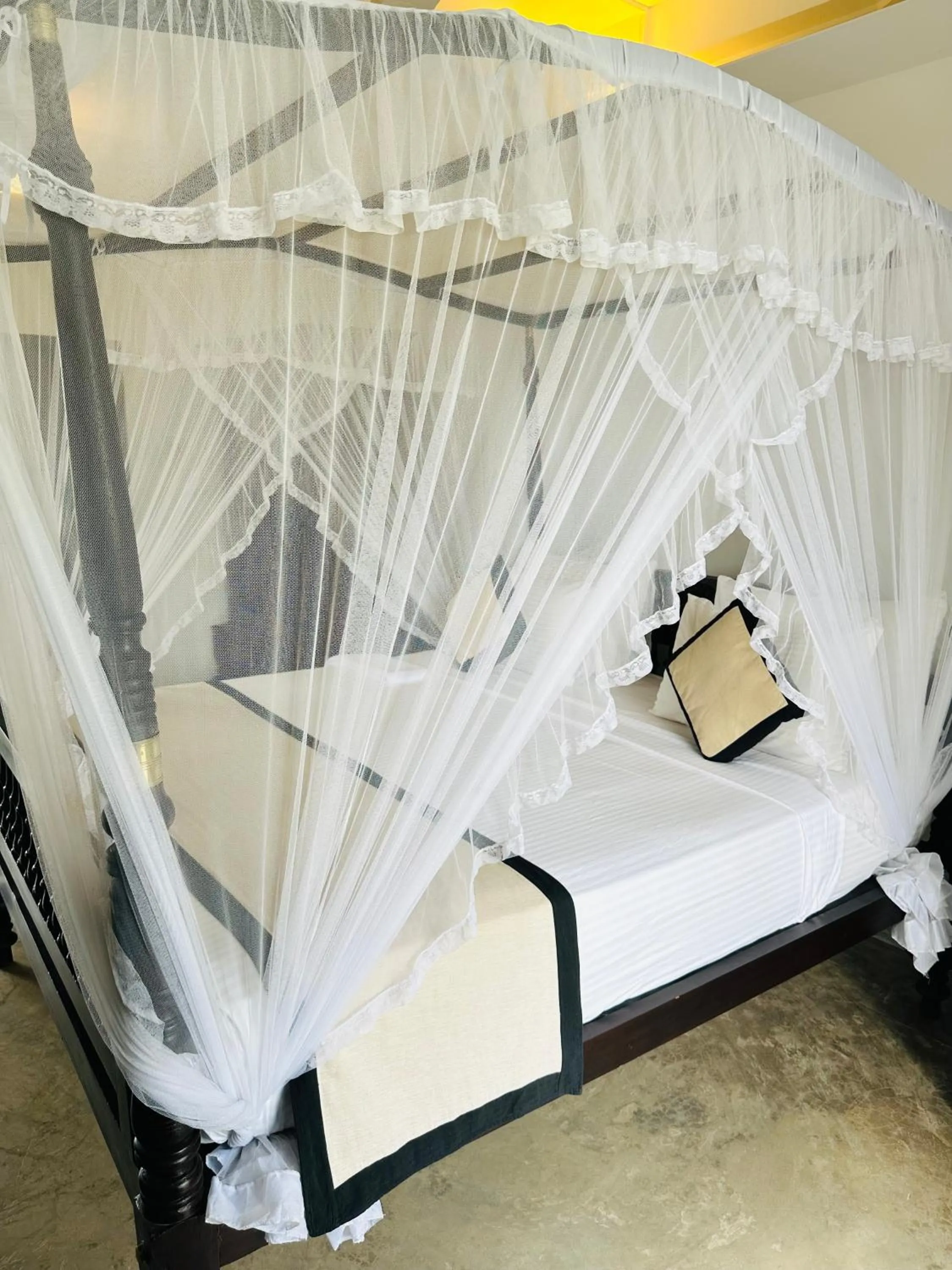 Bed in Mirissa Gate Resort