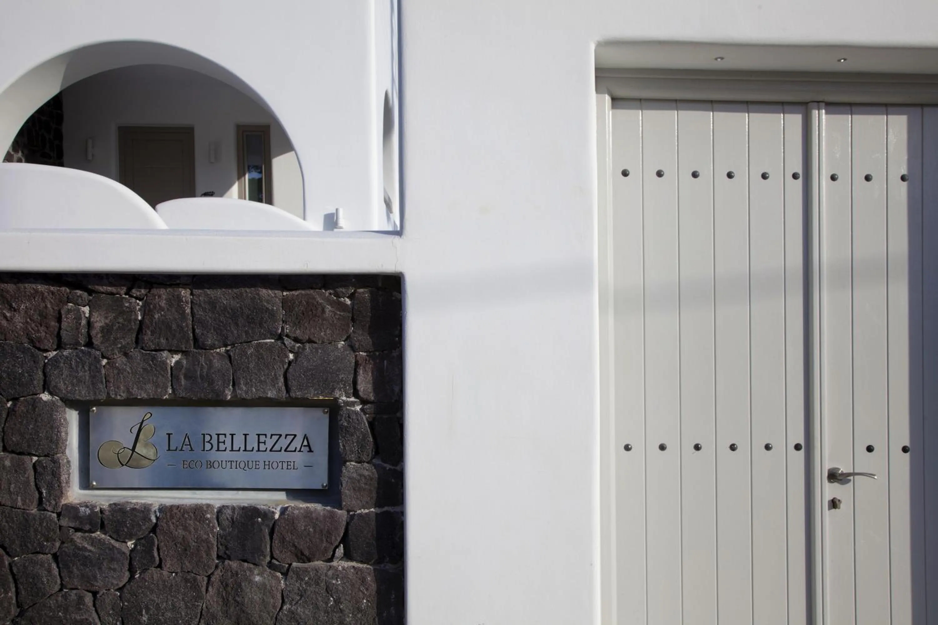 Property logo or sign in La Bellezza Eco Boutique Hotel