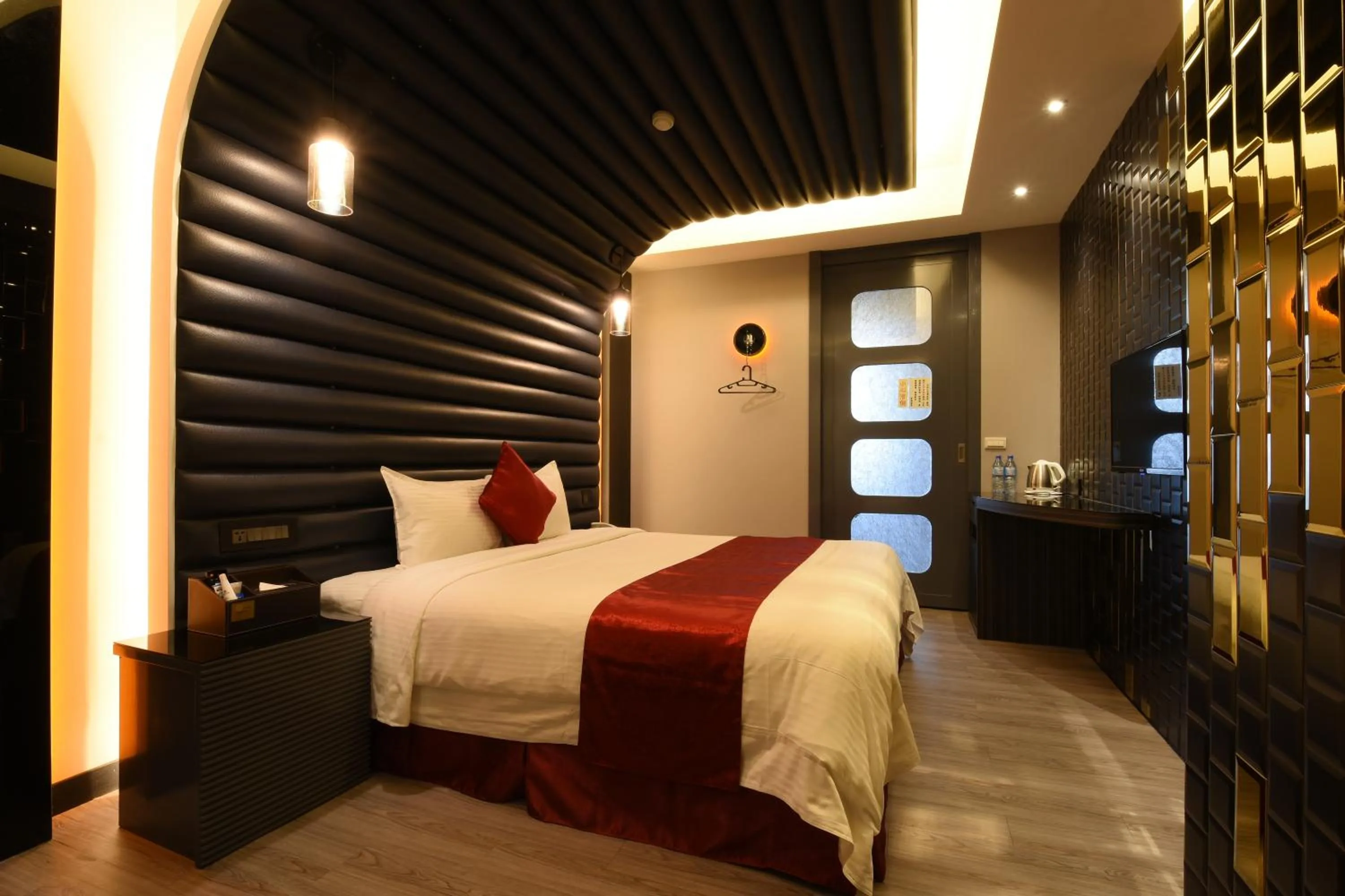 Bed in Jin Spa Resort Hotel