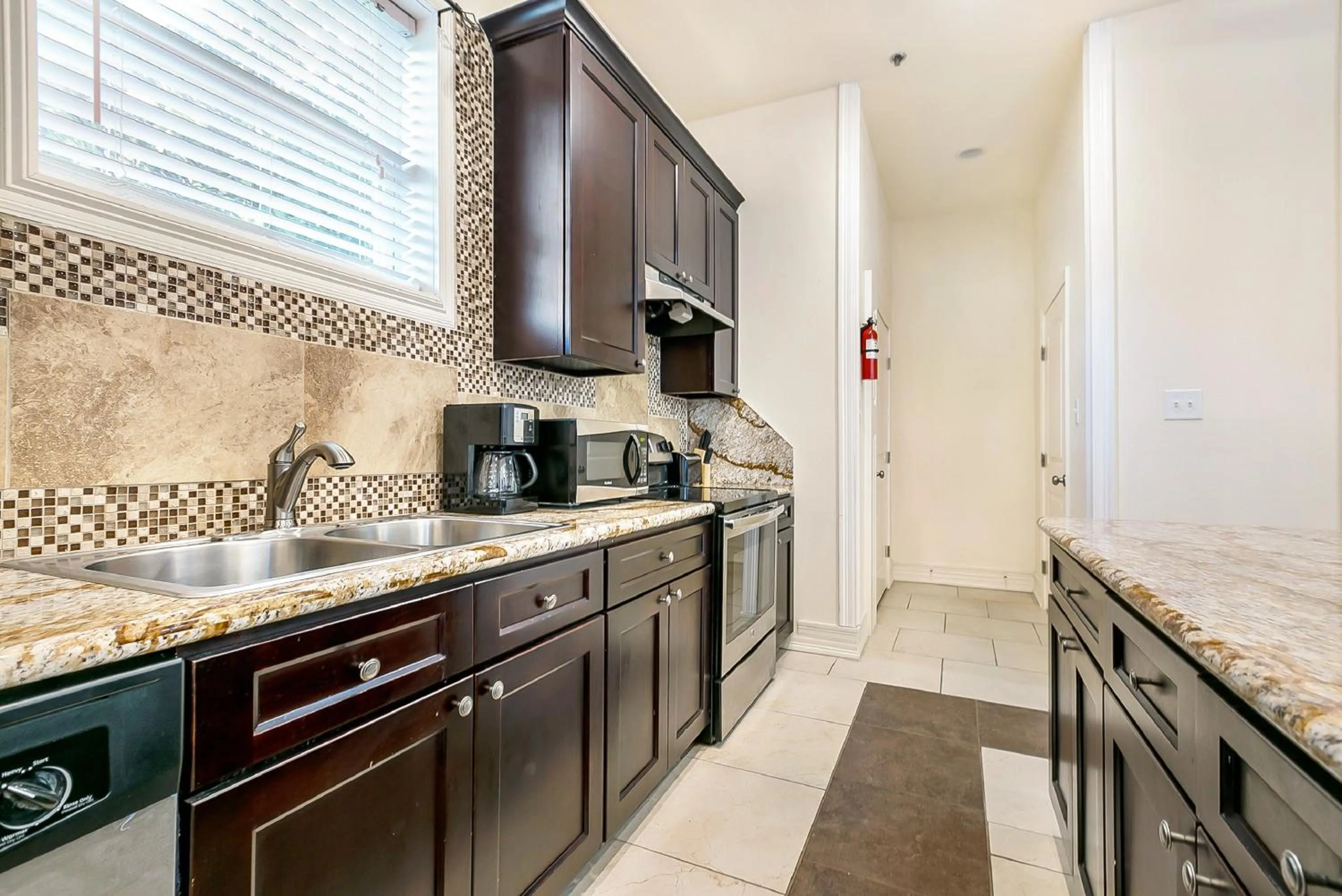 Kitchen or kitchenette in Modern, Spacious Condos with Luxury Amenities