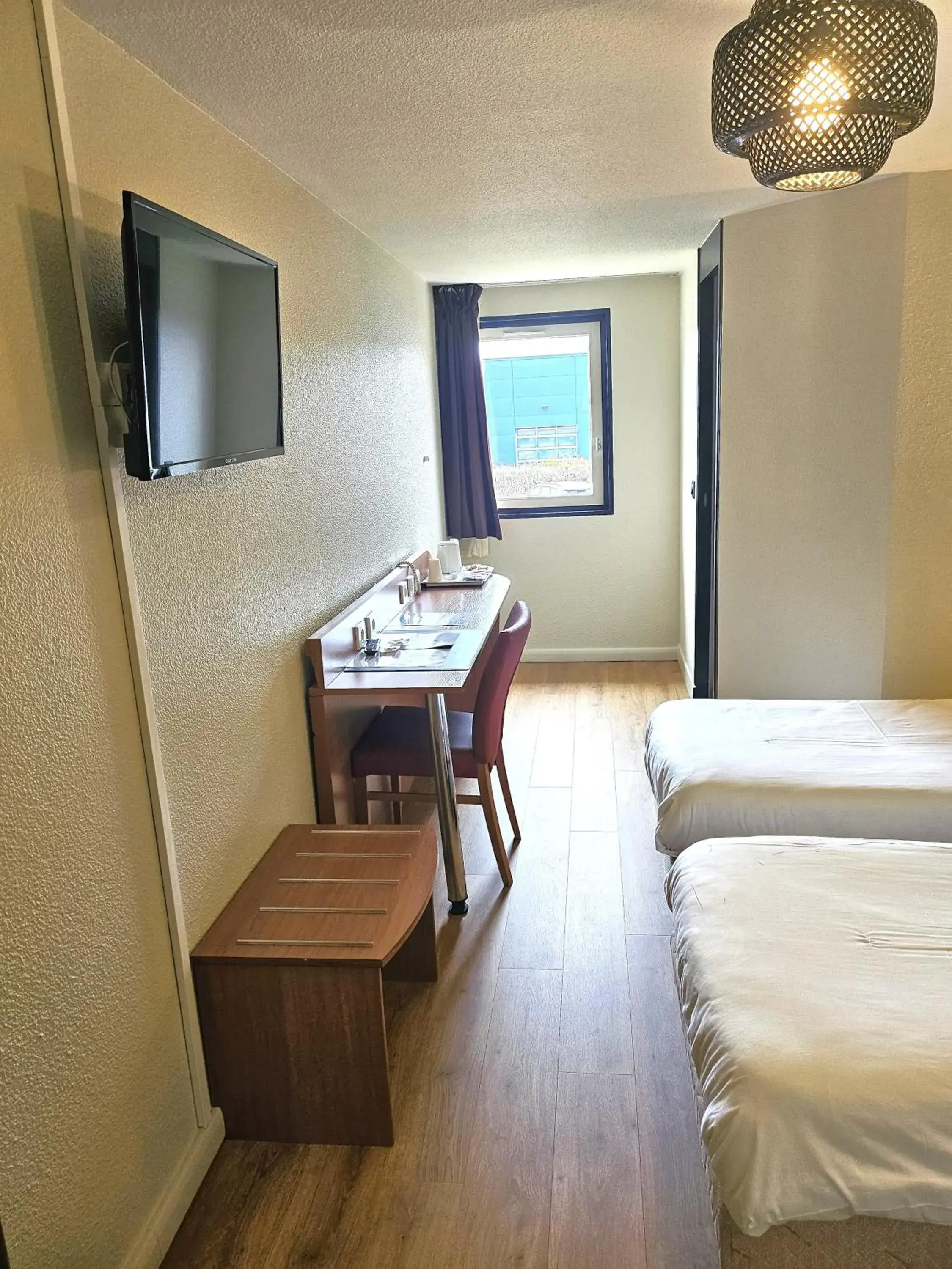 Bed in Kyriad Montargis Amilly Bed in Kyriad Montargis Amilly