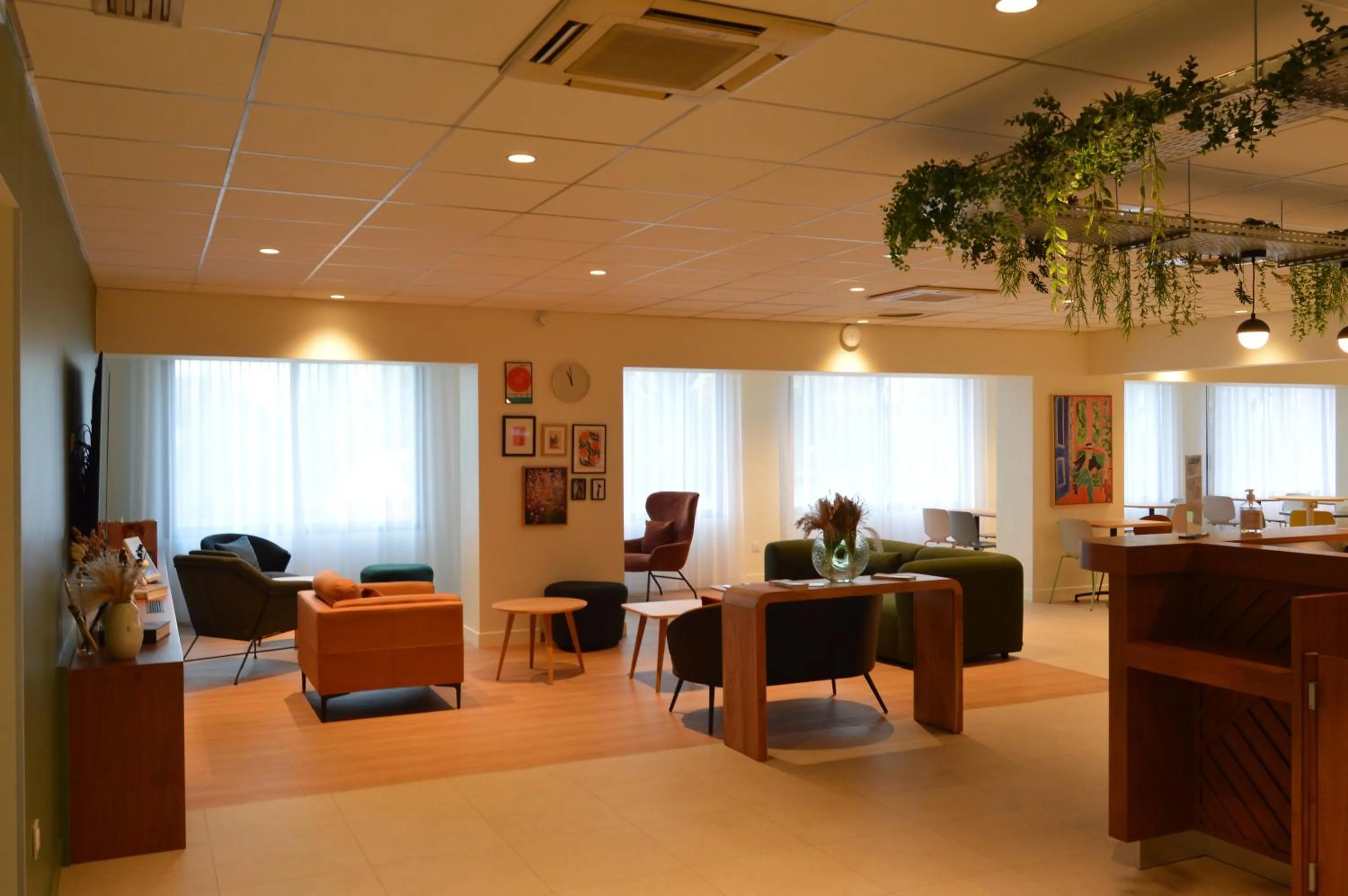 Communal lounge/ TV room in Kyriad Argenteuil