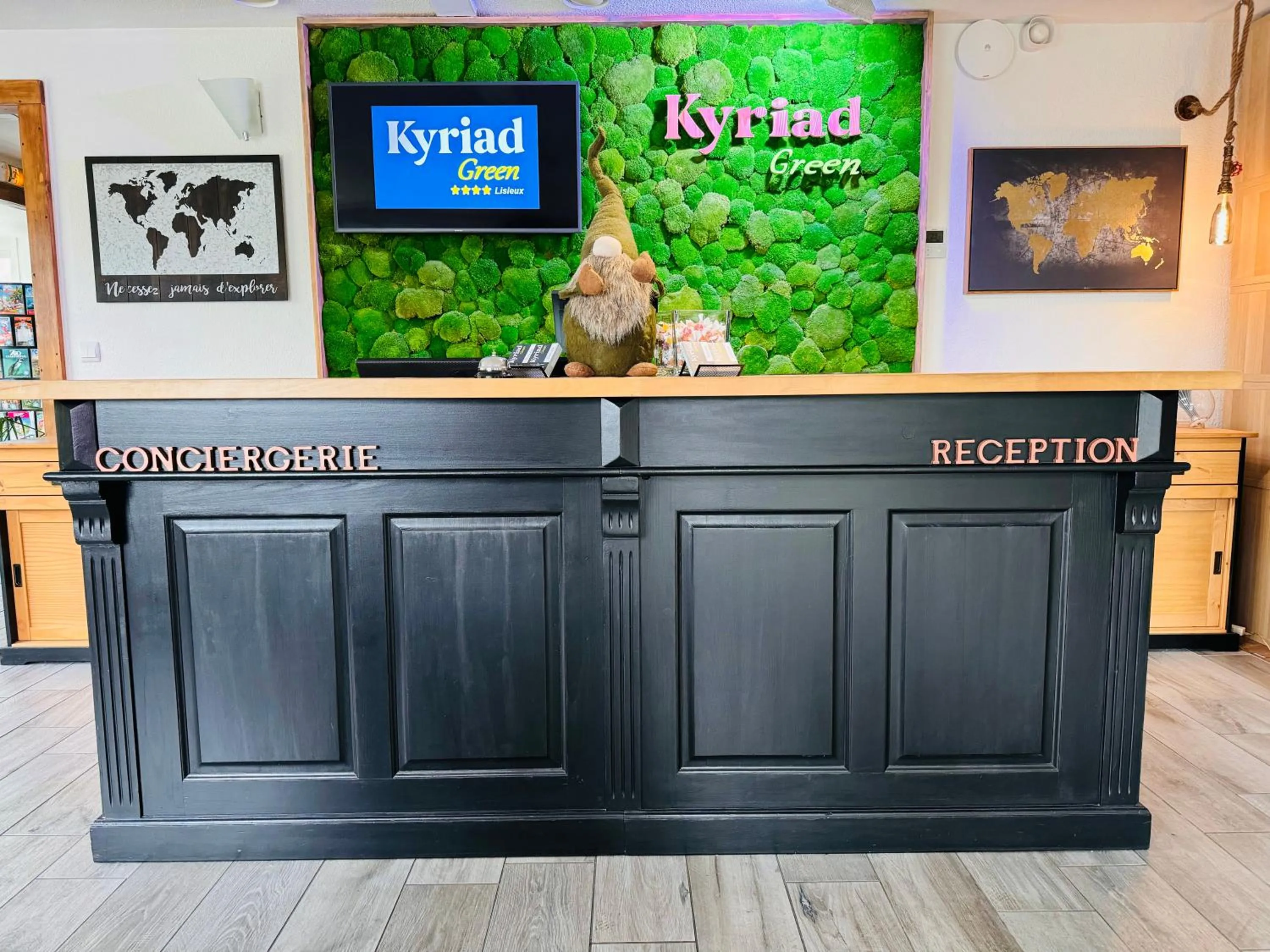 Communal lounge/ TV room in Kyriad Lisieux