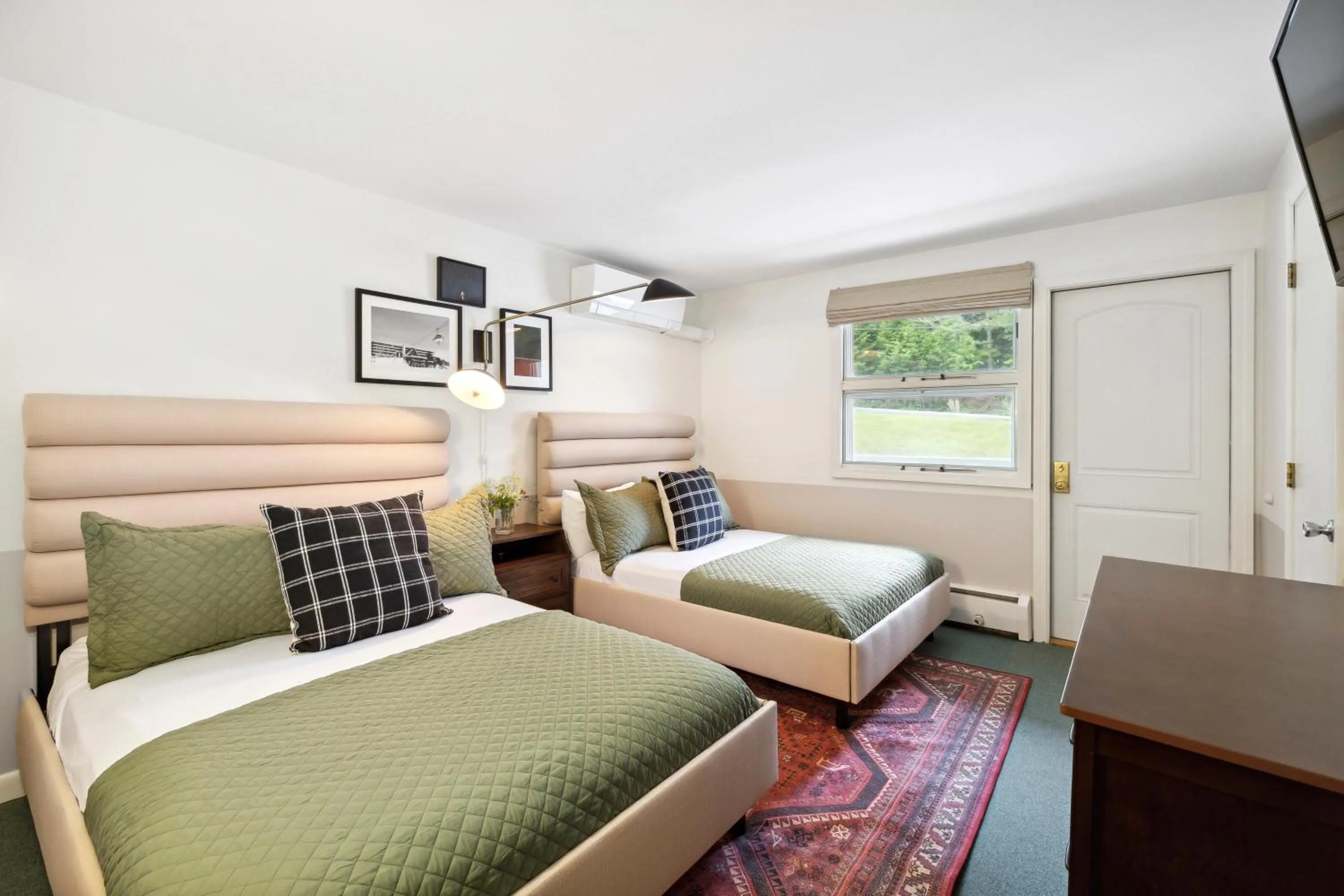 Bed in Mountaineer Inn