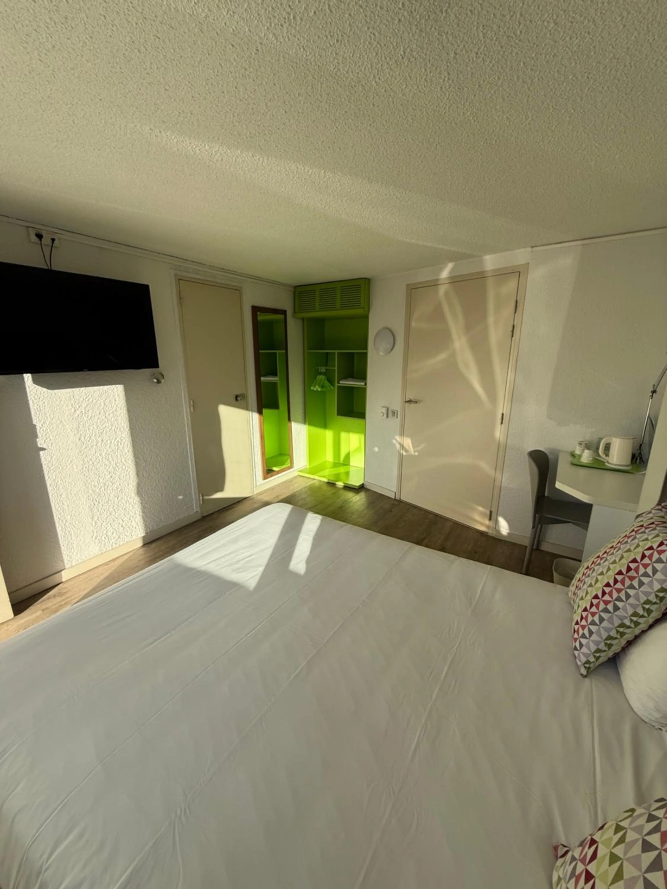 wardrobe, Bed in Hotel Morangis Orly