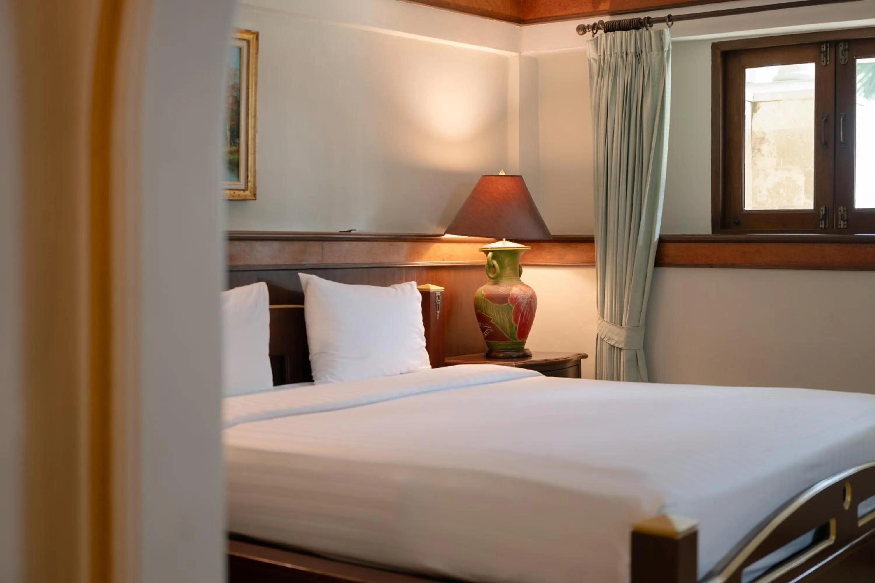 Photo of the whole room, Bed in Erawan Phangnga Hotel, Natai Beach