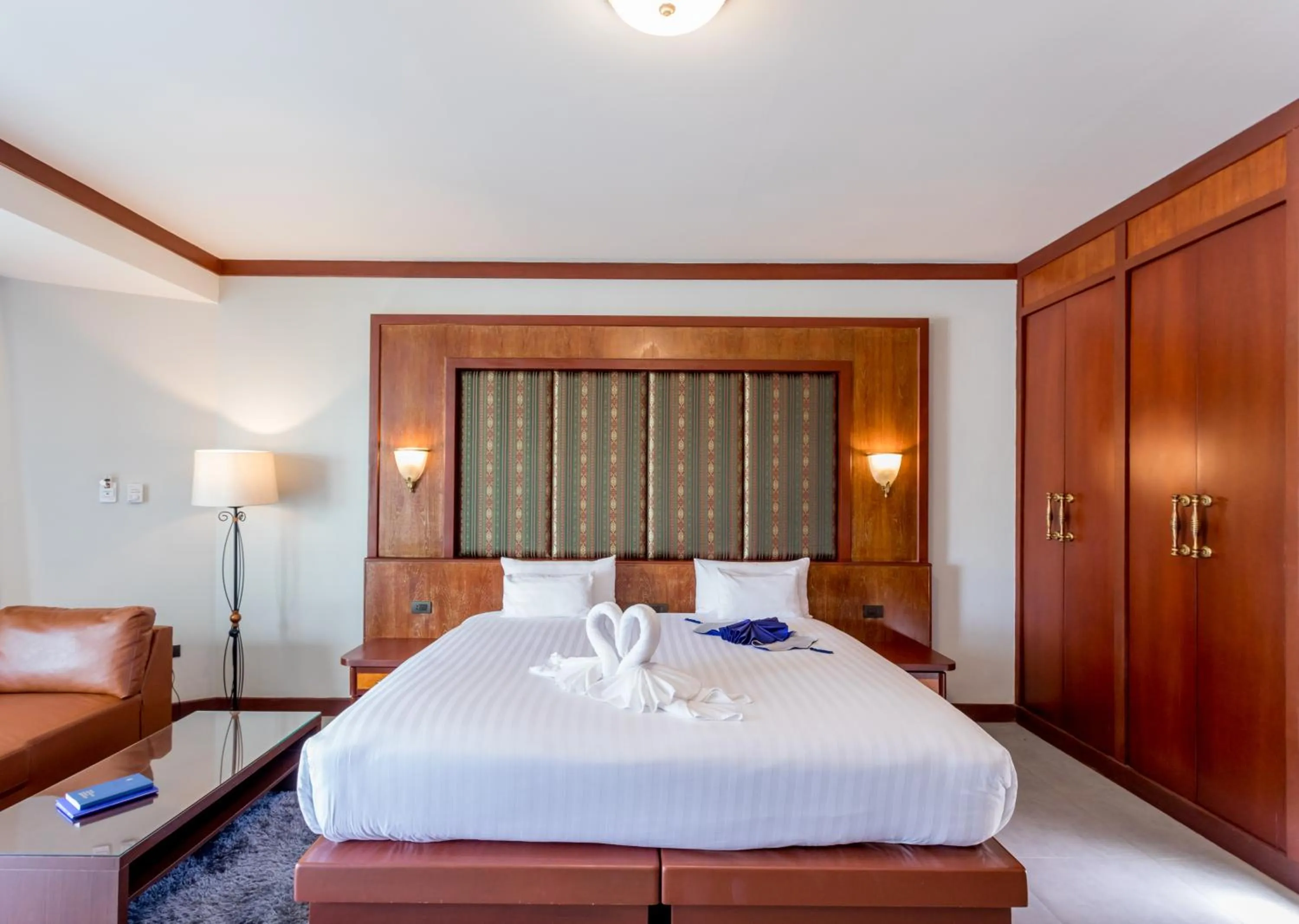 Bed in Erawan Phangnga Hotel, Natai Beach