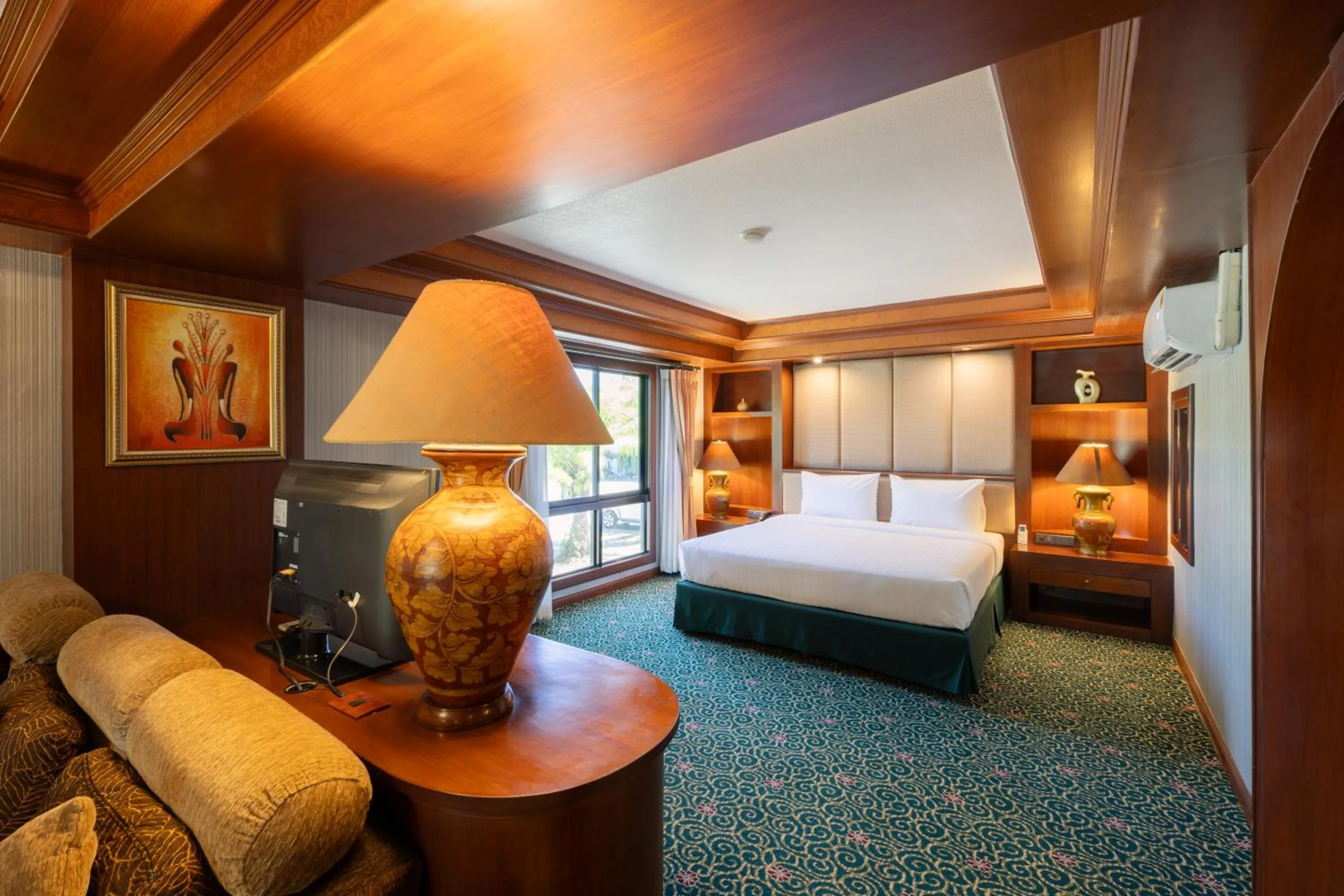 Photo of the whole room, Bed in Erawan Phangnga Hotel, Natai Beach