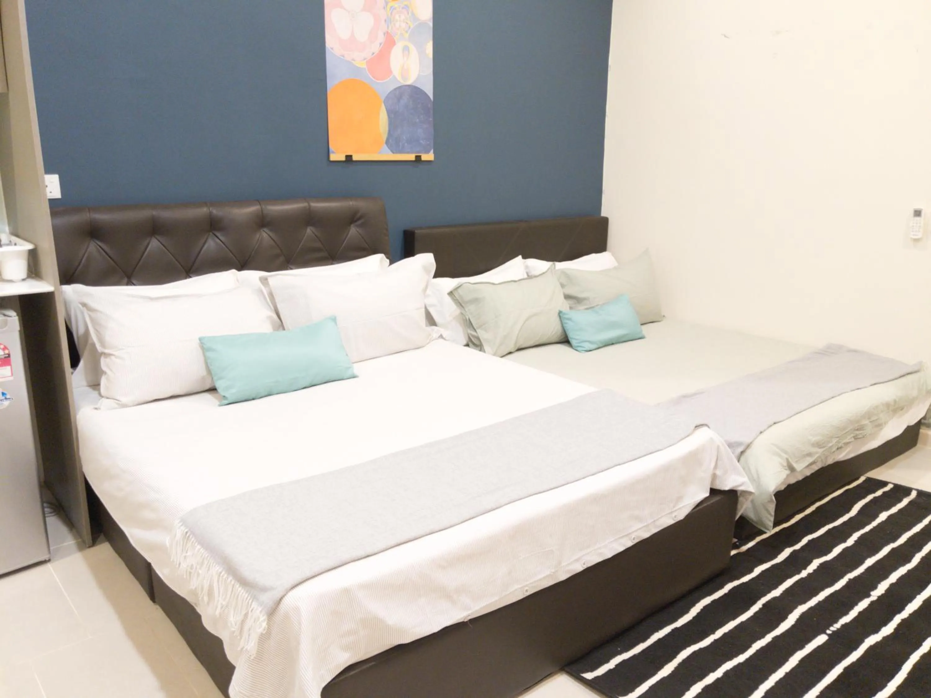 Bed in Tamarind Suites or D'Pulze Residence or Domain NeoCyber, click Room selection for location and pics