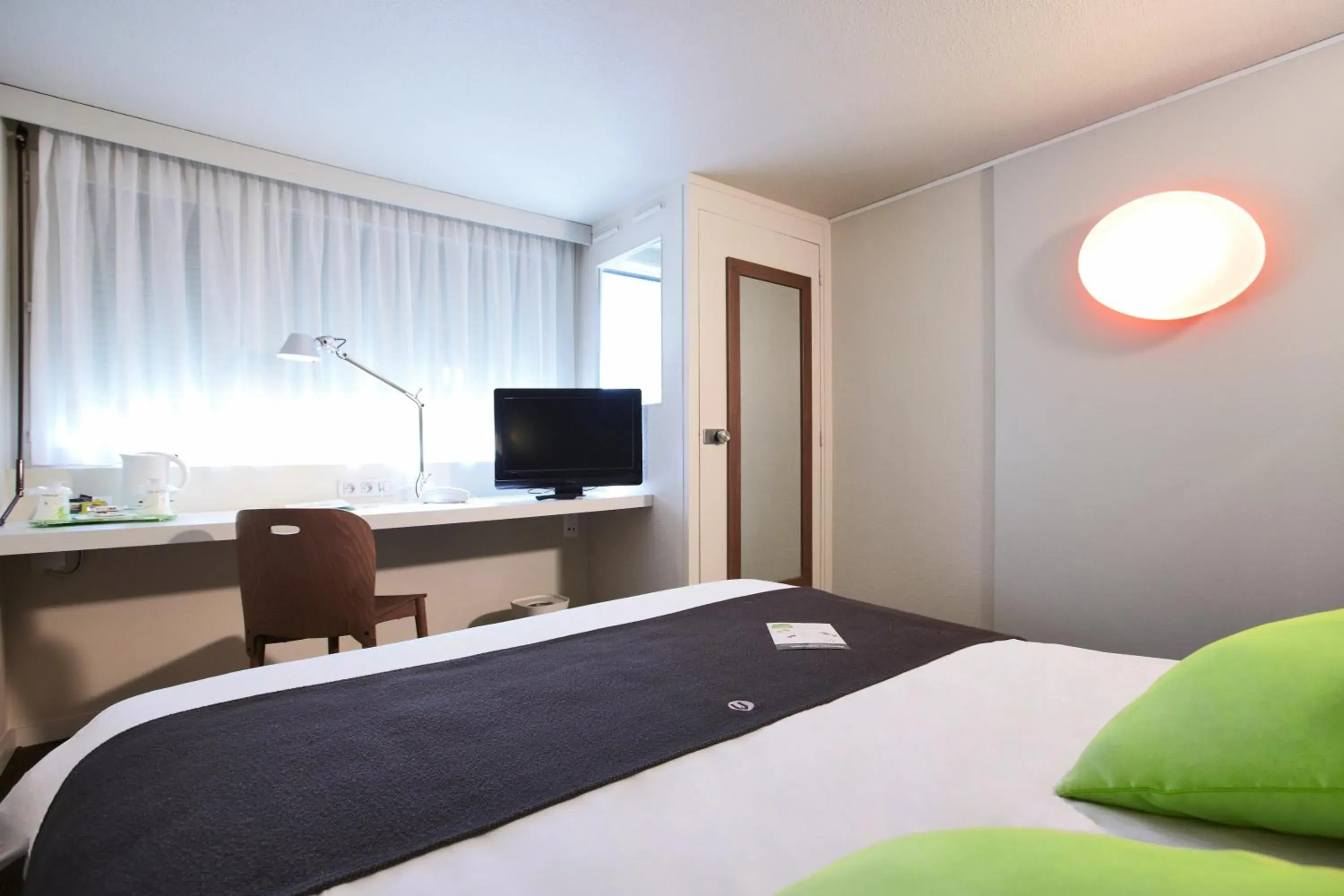 Seating area, Bed in Campanile Vierzon Seating area, Bed in Campanile Vierzon