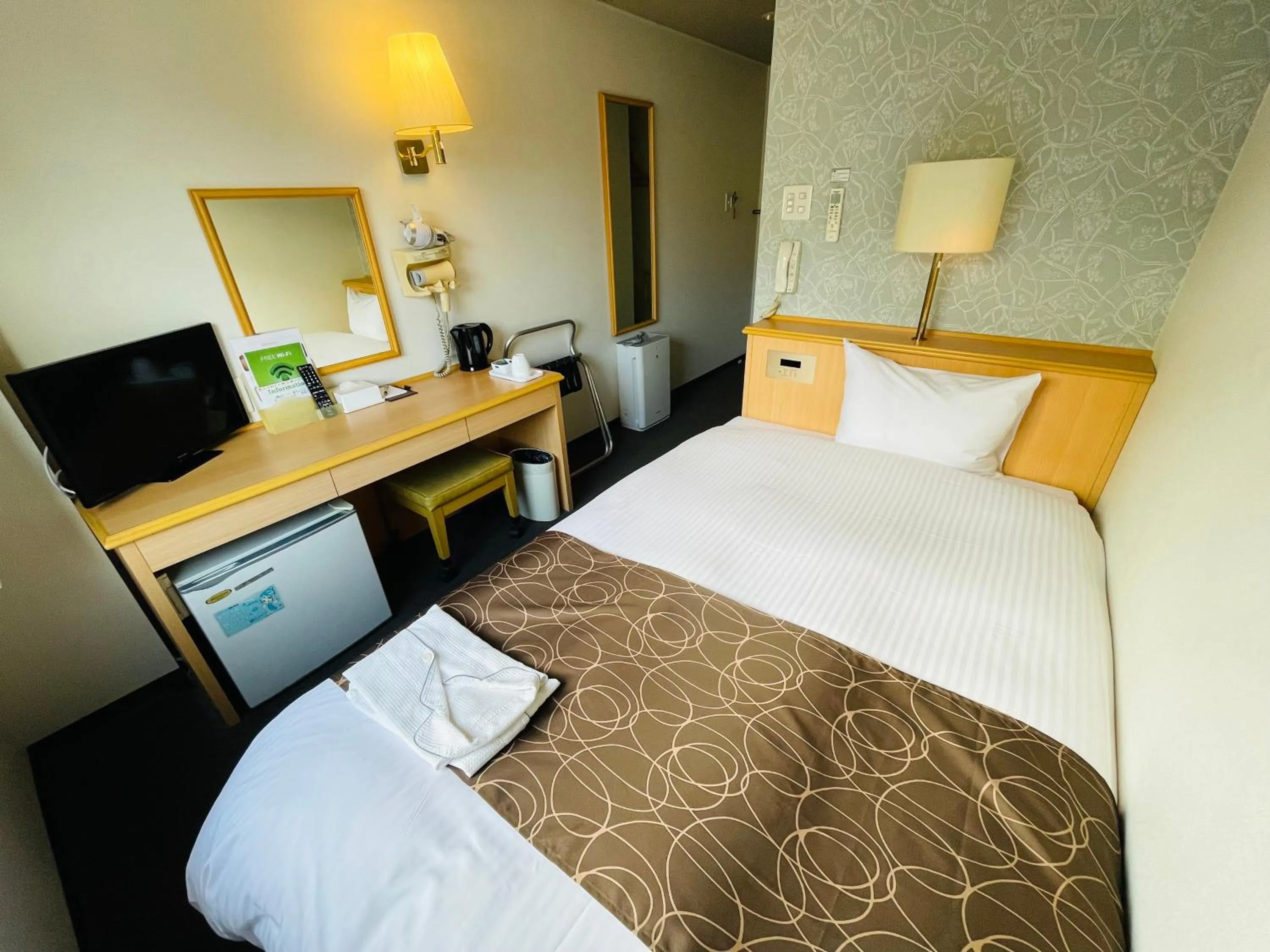 Bed in Saga Idaimae Green Hotel