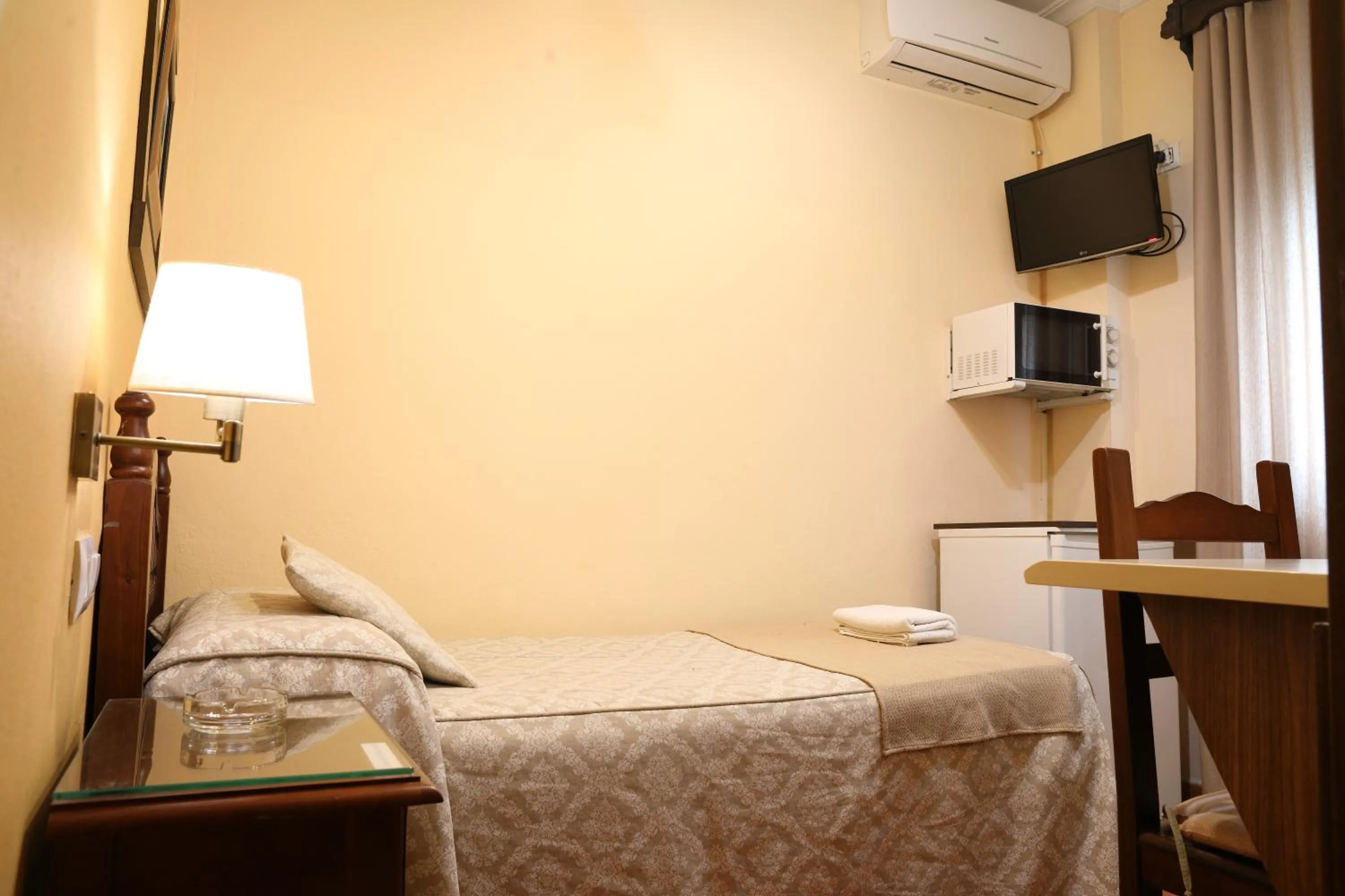 Photo of the whole room, Bed in Hostal Rocio