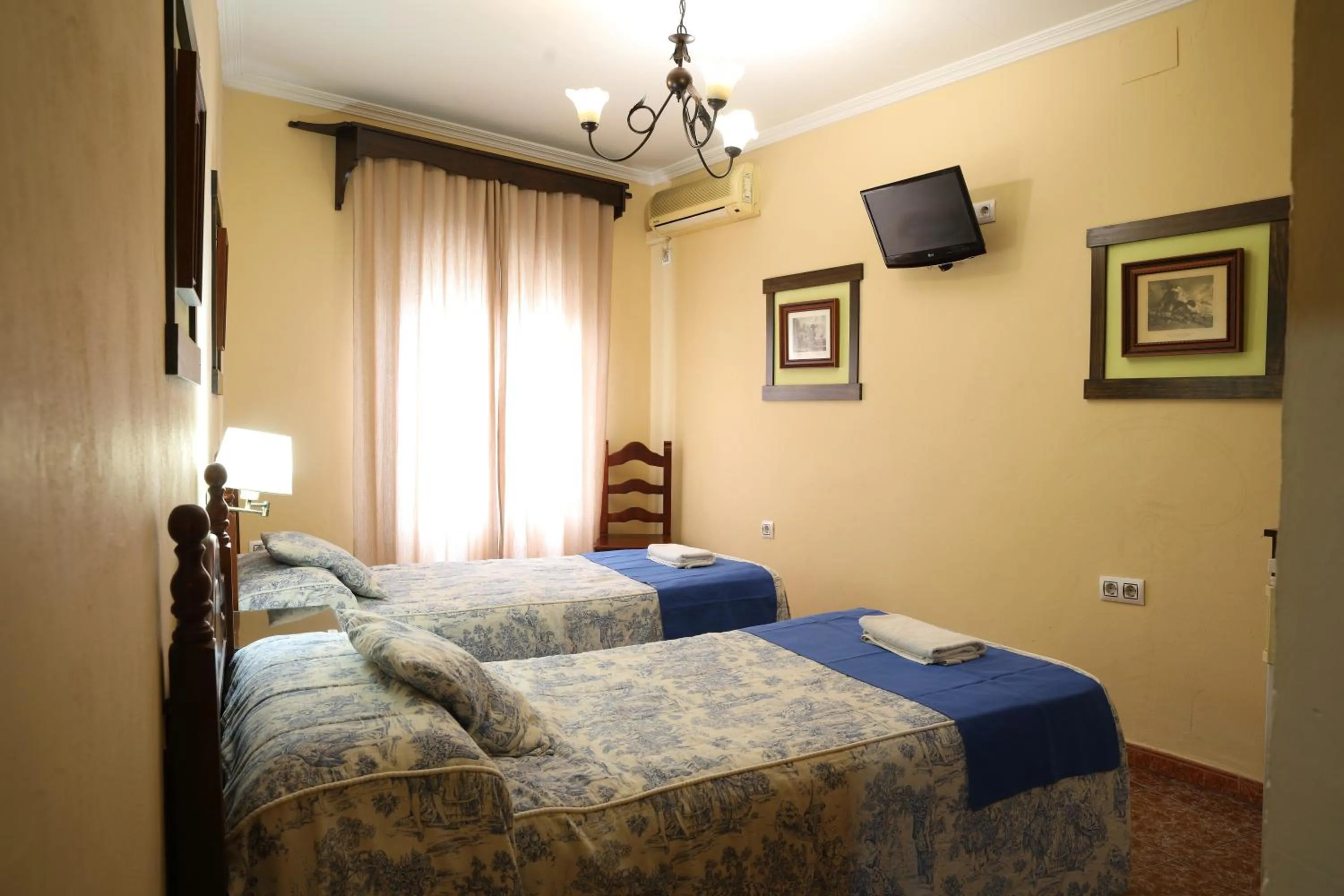 Photo of the whole room, Bed in Hostal Rocio