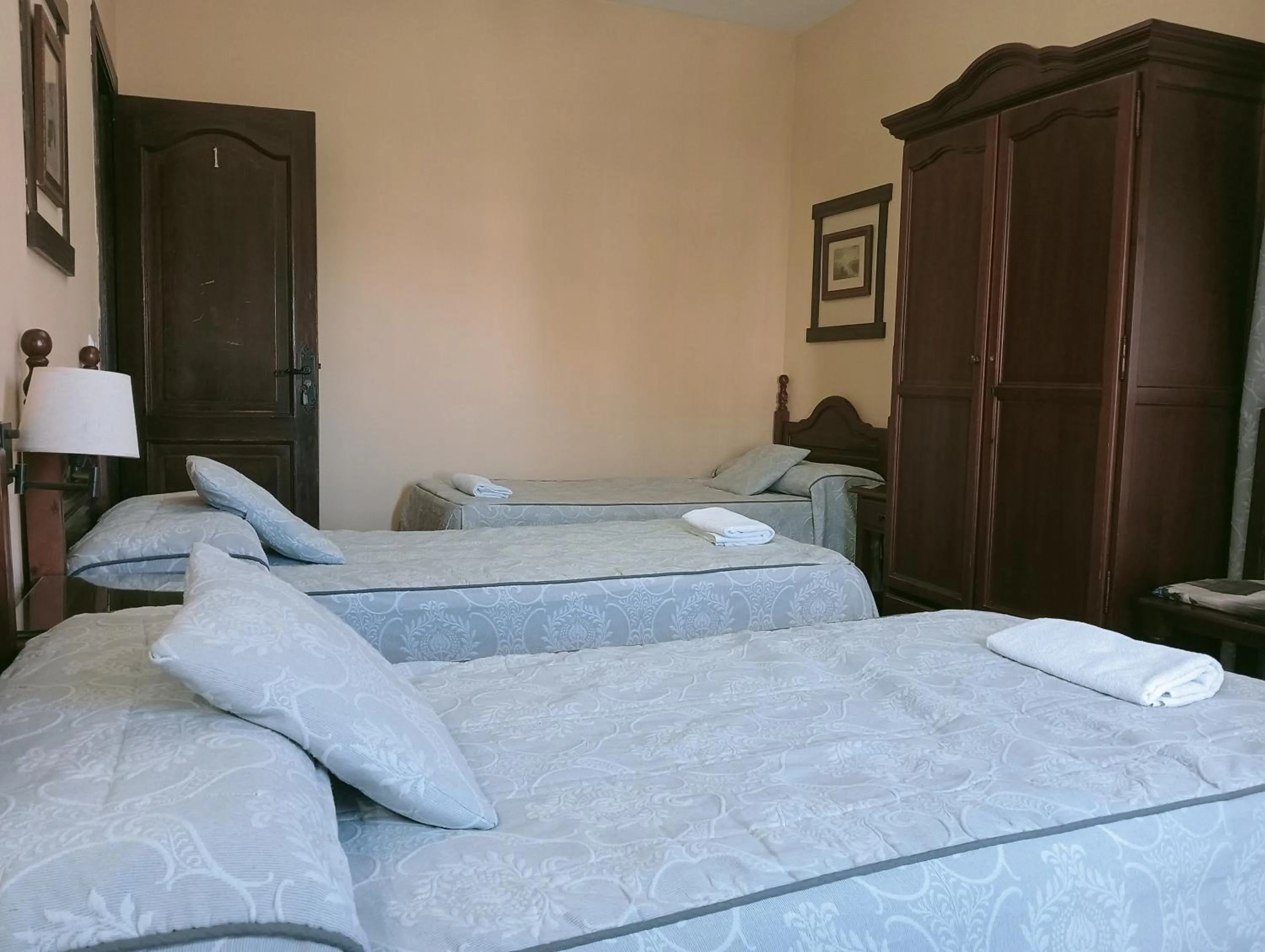 Photo of the whole room, Bed in Hostal Rocio