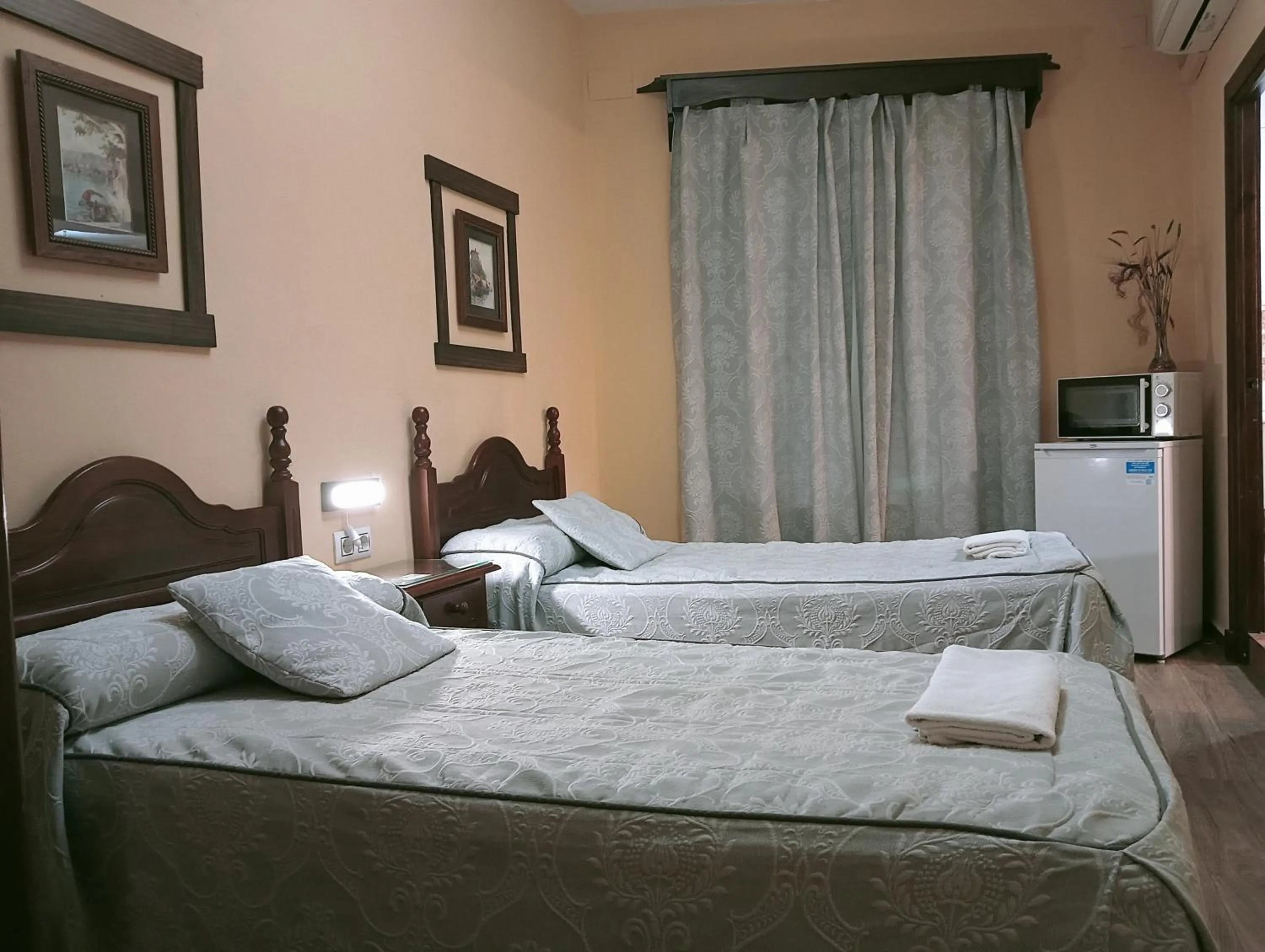 Photo of the whole room, Bed in Hostal Rocio