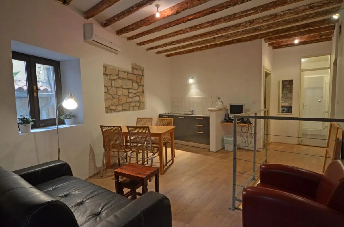 Kitchen or kitchenette in Apartment Il Cortile with garden and parking