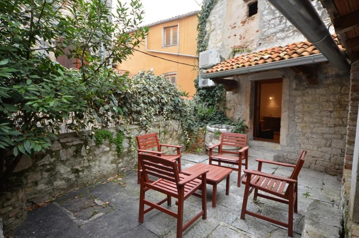 Balcony/Terrace in Apartment Il Cortile with garden and parking