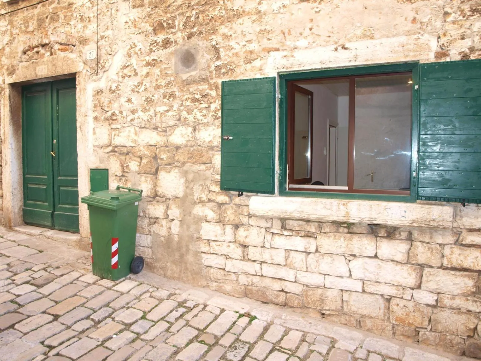 Facade/entrance in Apartment Il Cortile with garden and parking