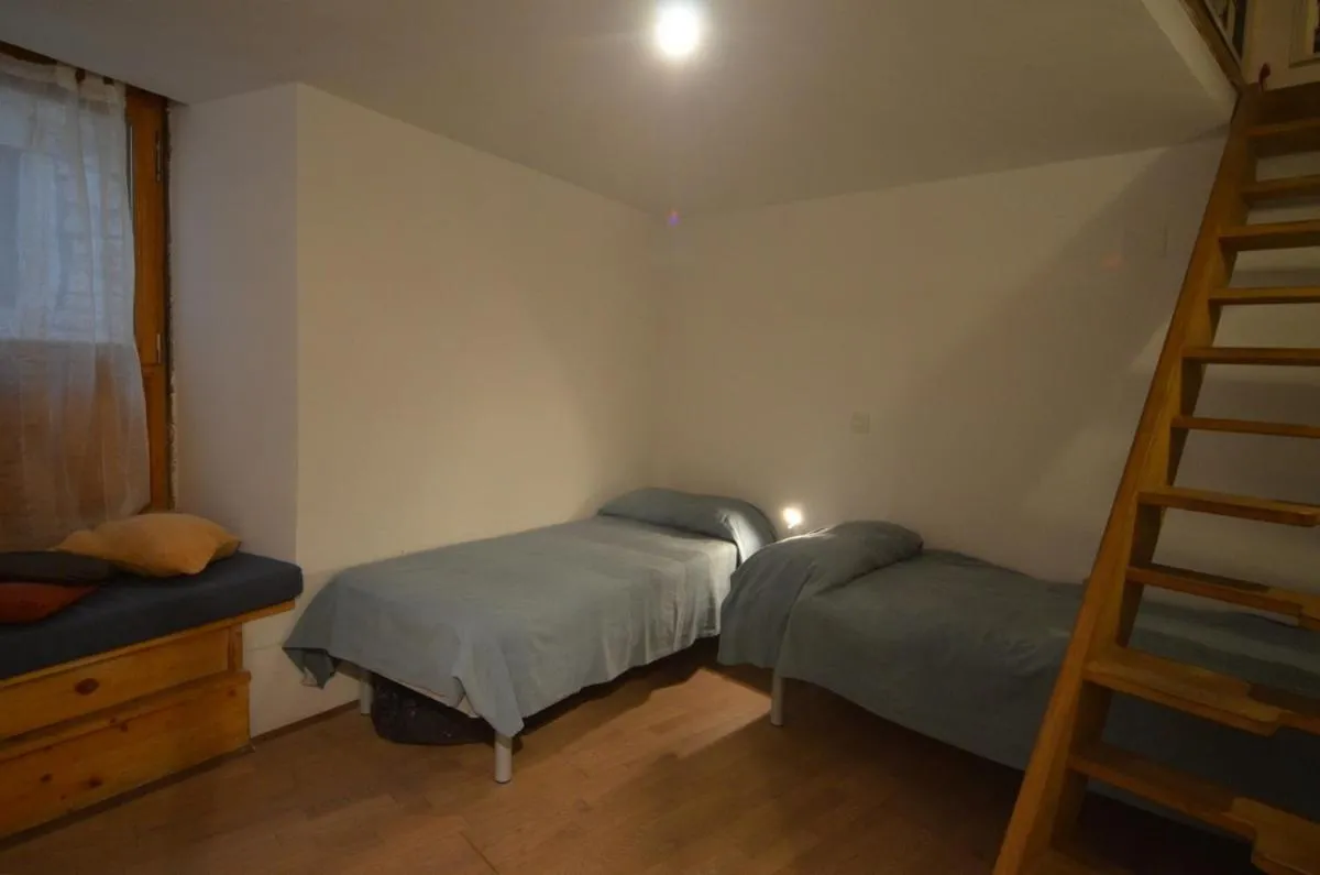 Bedroom, Bed in Apartment Il Cortile with garden and parking