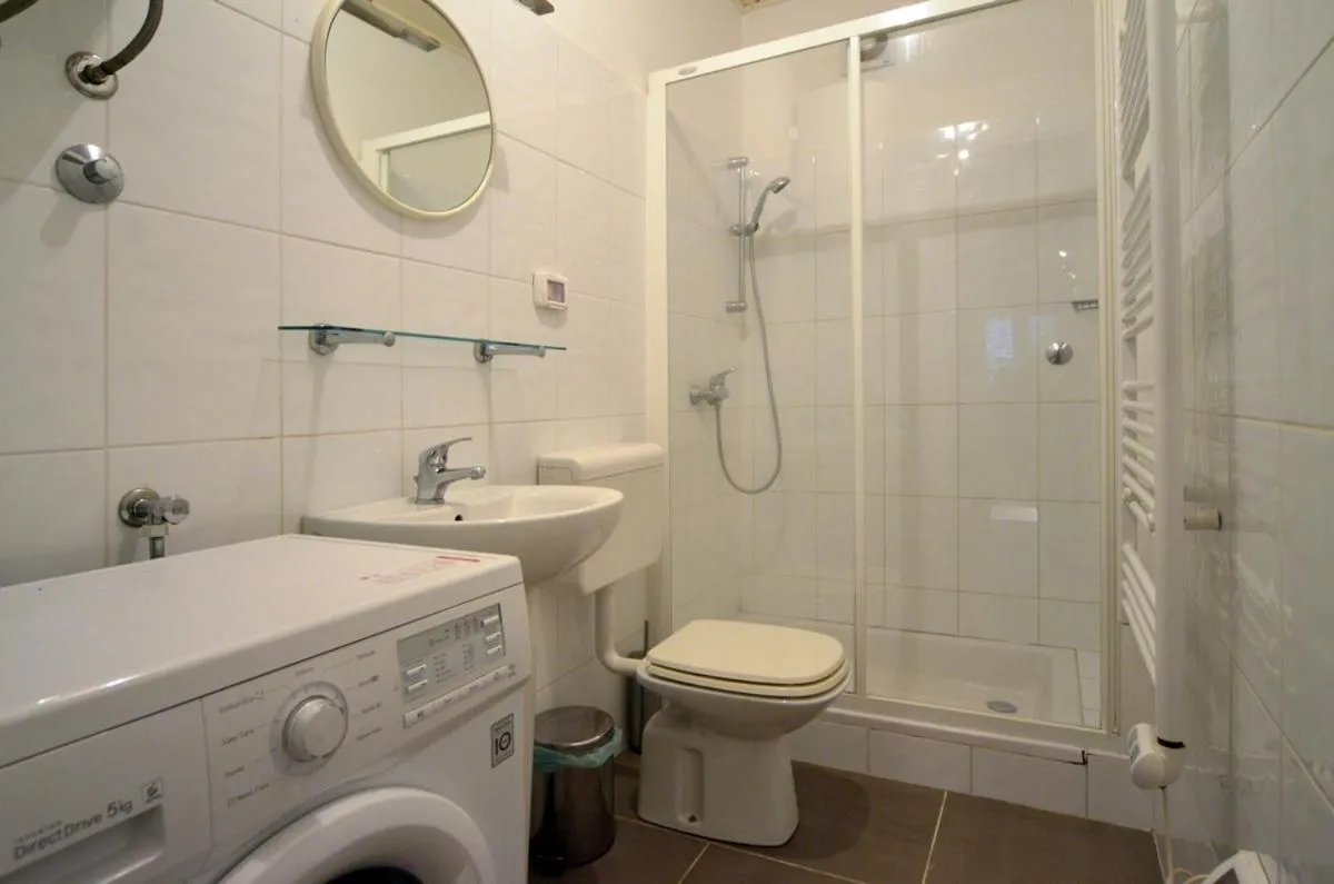 Bathroom in Apartment Il Cortile with garden and parking