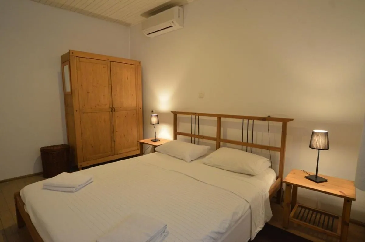 Bedroom, Bed in Apartment Il Cortile with garden and parking