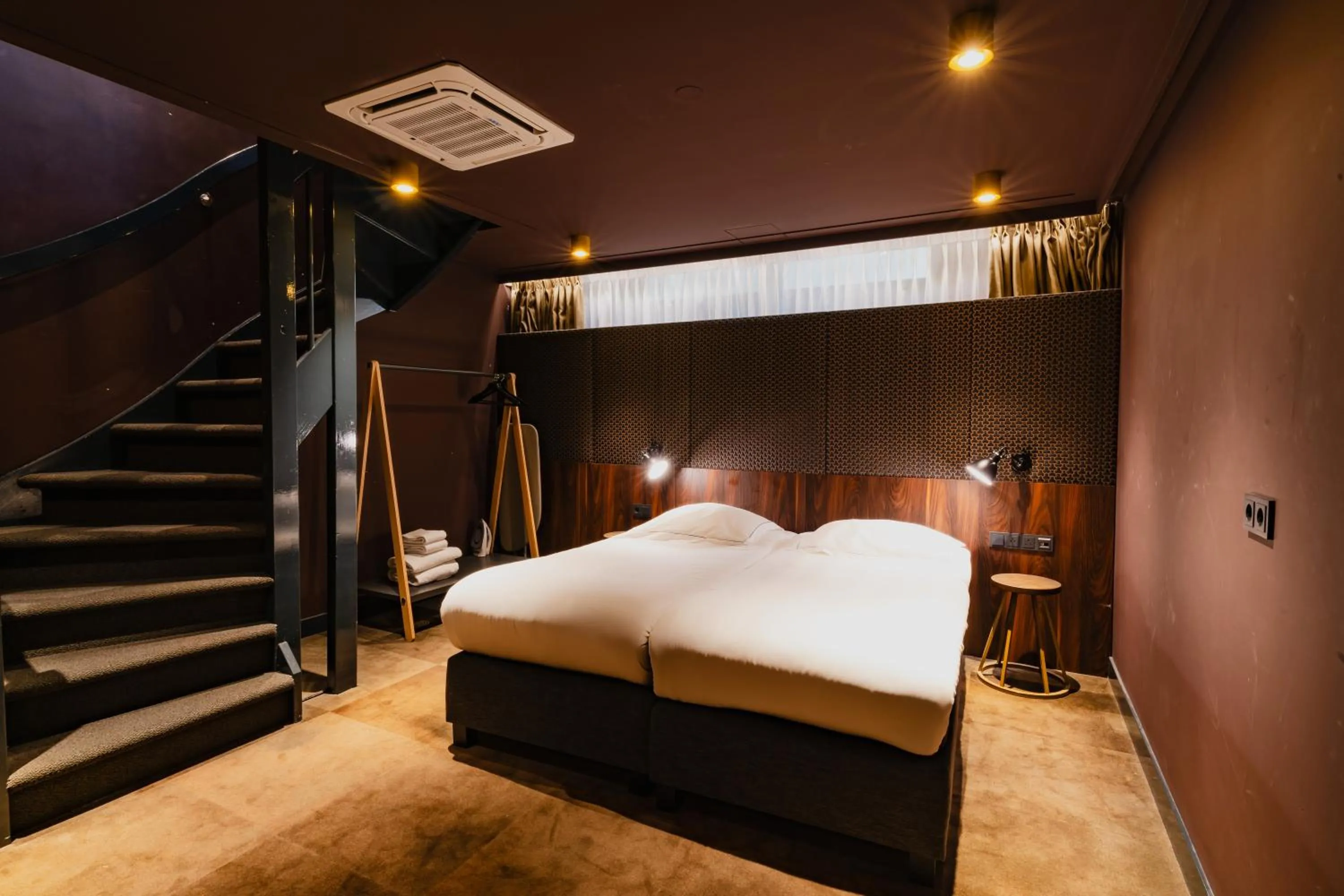 Bed in De Jonker Urban Suites