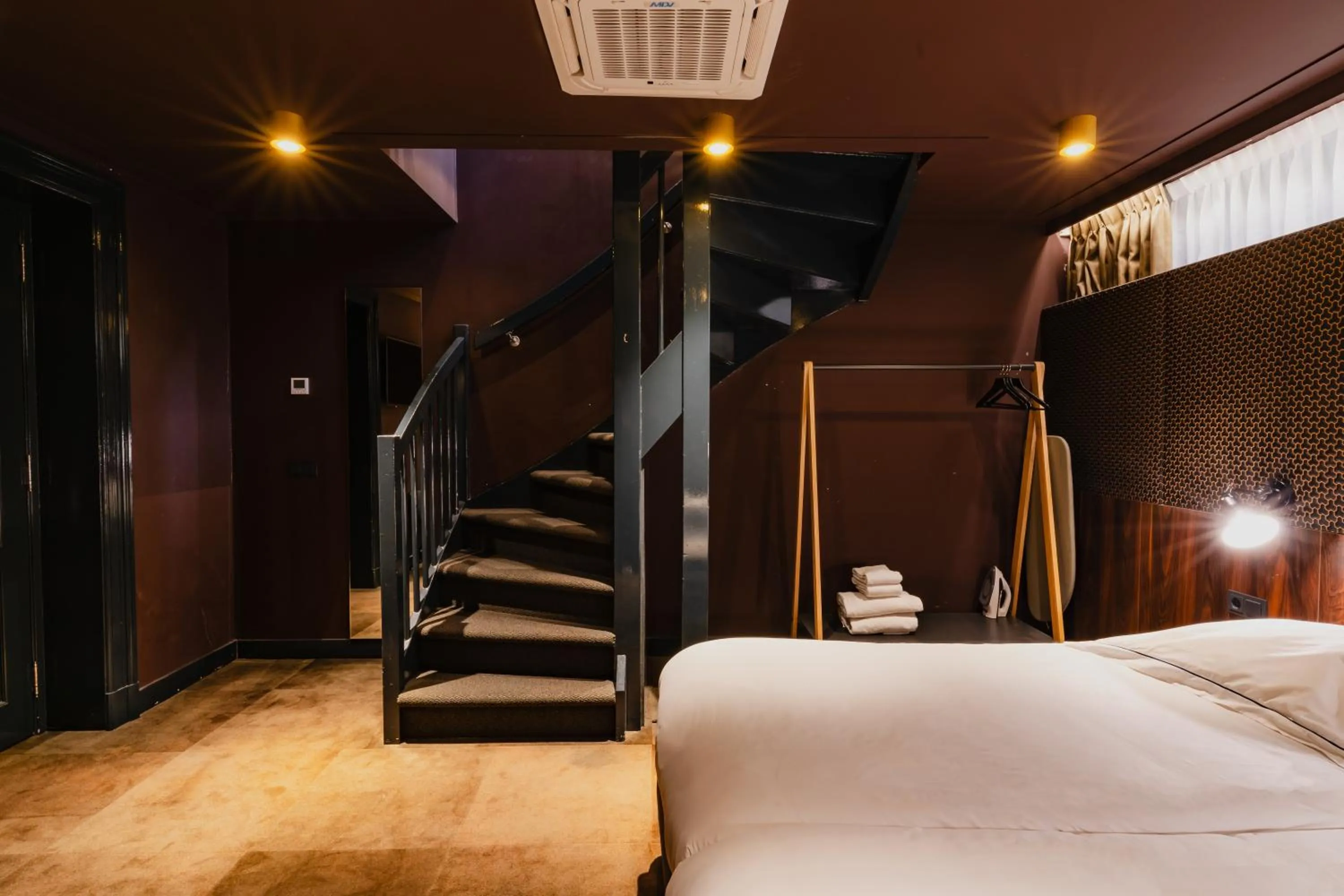 Bed in De Jonker Urban Suites