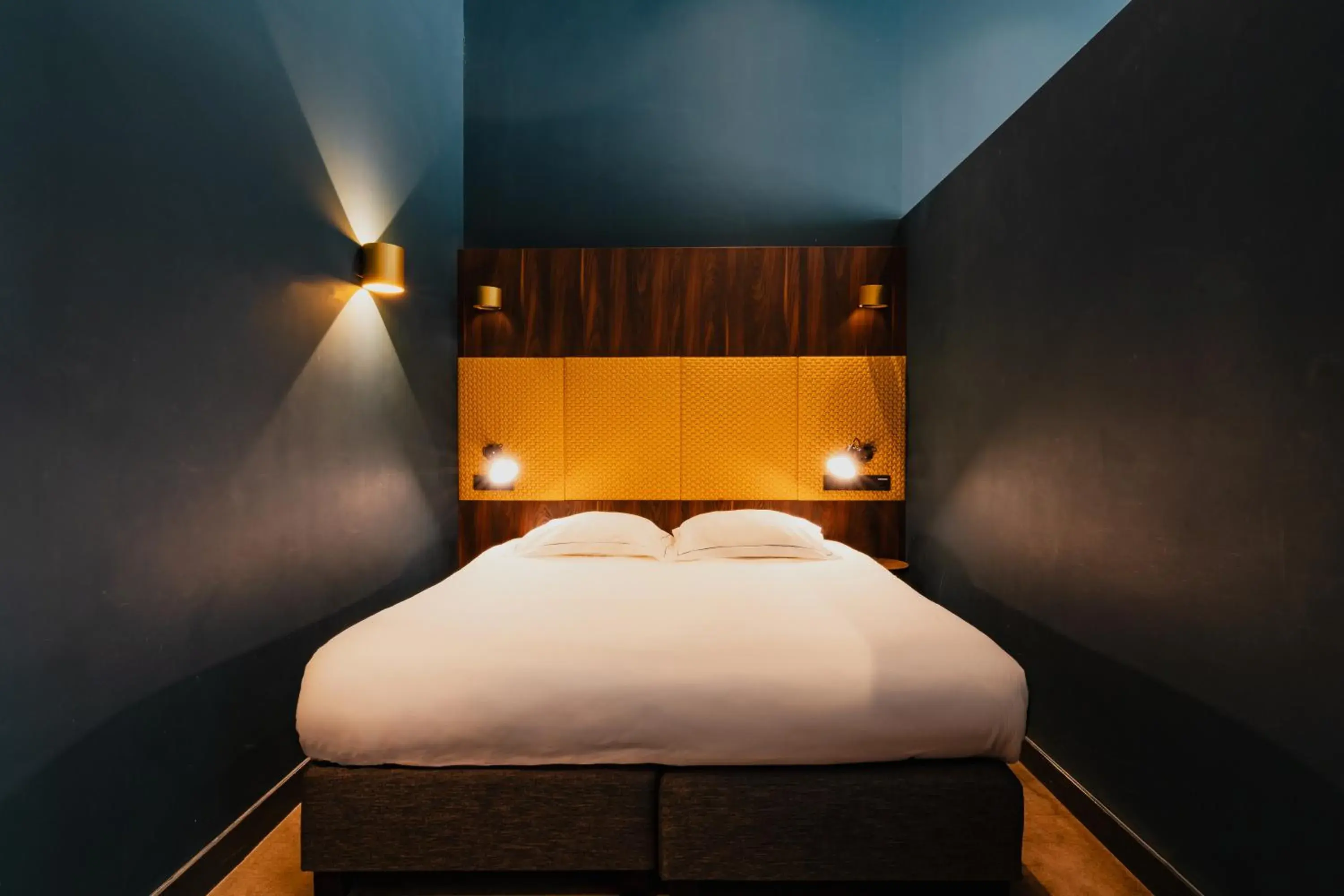 Bed in De Jonker Urban Suites Bed in De Jonker Urban Suites